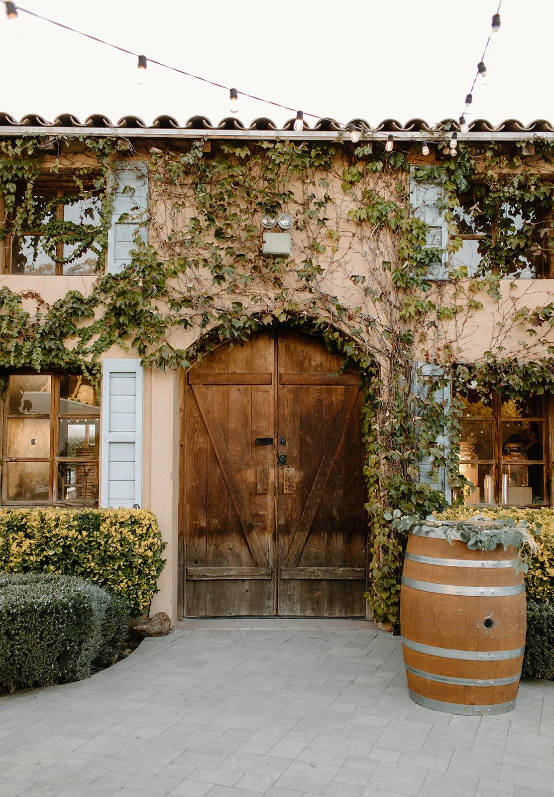 The wooden doors and romantic entryway to the Crush House at Milagro in Ramona, California. 