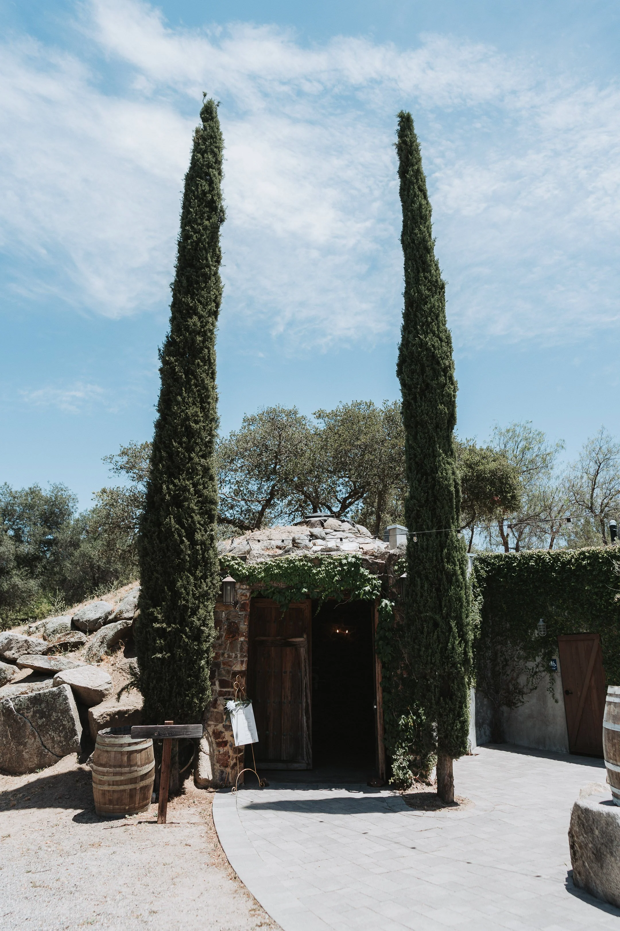 The hidden entryway to the stone-lined walls of Wine Cave at Milagro in Ramona, California.