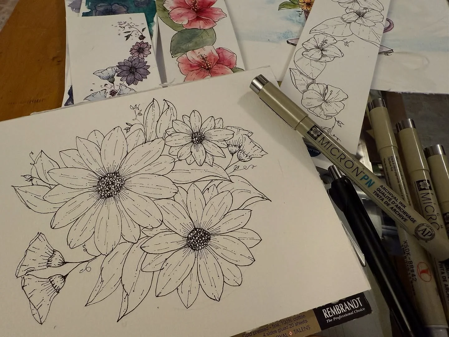 The storms have been a little more time away from the studio, but it’s never a bad time to get some ink work done. These are destined to be #watercolorandink original artwork and bookmarks :). #watercolor #watercolorartist #watercolorartwork #