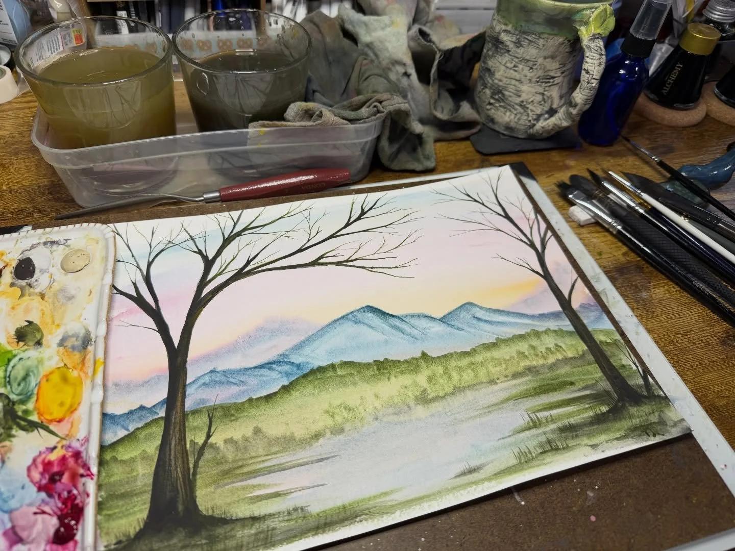 Those spring sunrises are starting to show their colors&hellip; and the green is peaking thru, little by little&hellip; just felt inspired for a spring colored landscape&hellip; :) #watercolorartwork #watercolorlandscape #massachusettsartist #artheal