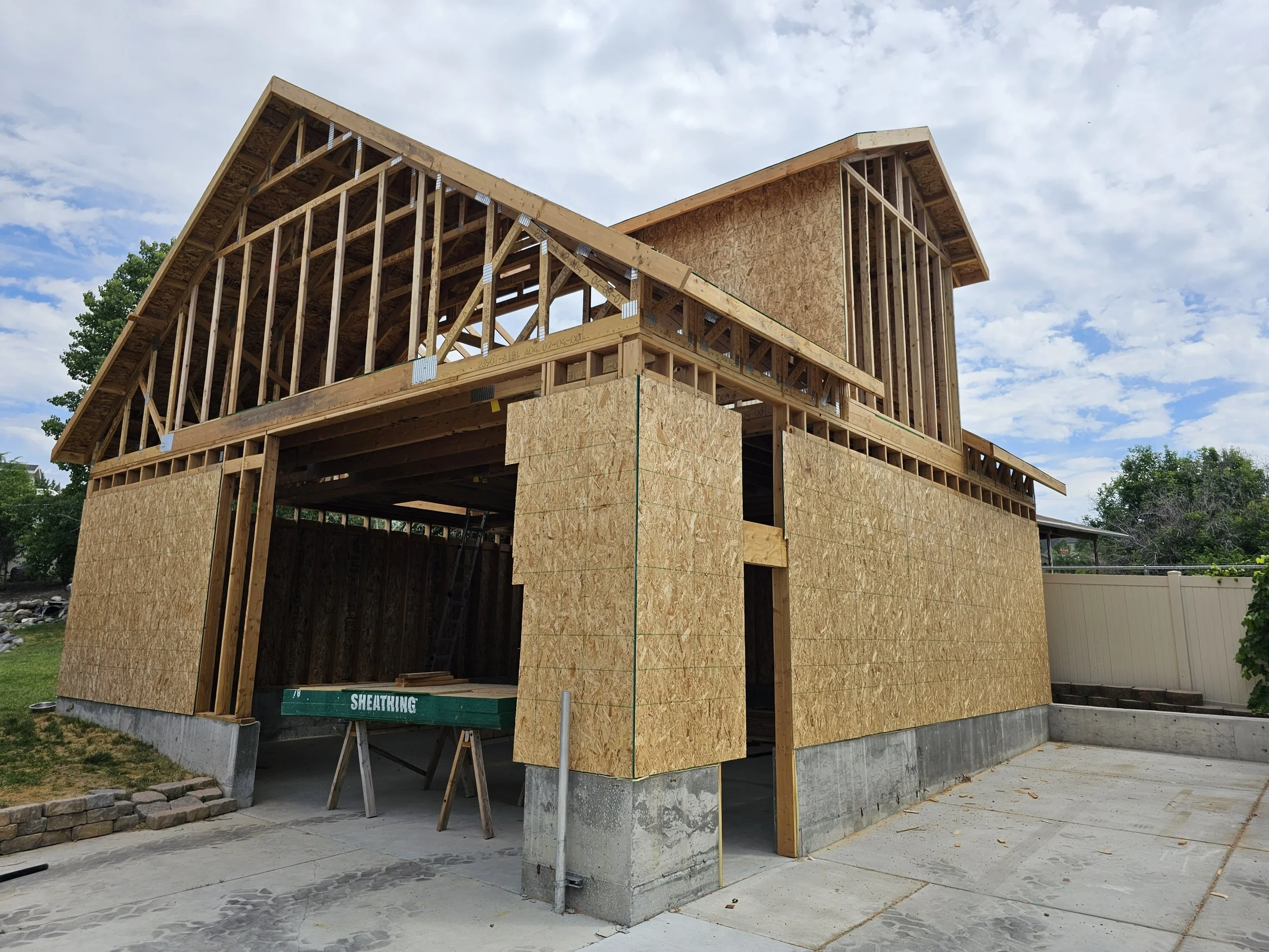 Custom garage shop framing in Boise, Idaho by Jenkins Custom Built showing residential wood framing and loft construction.
