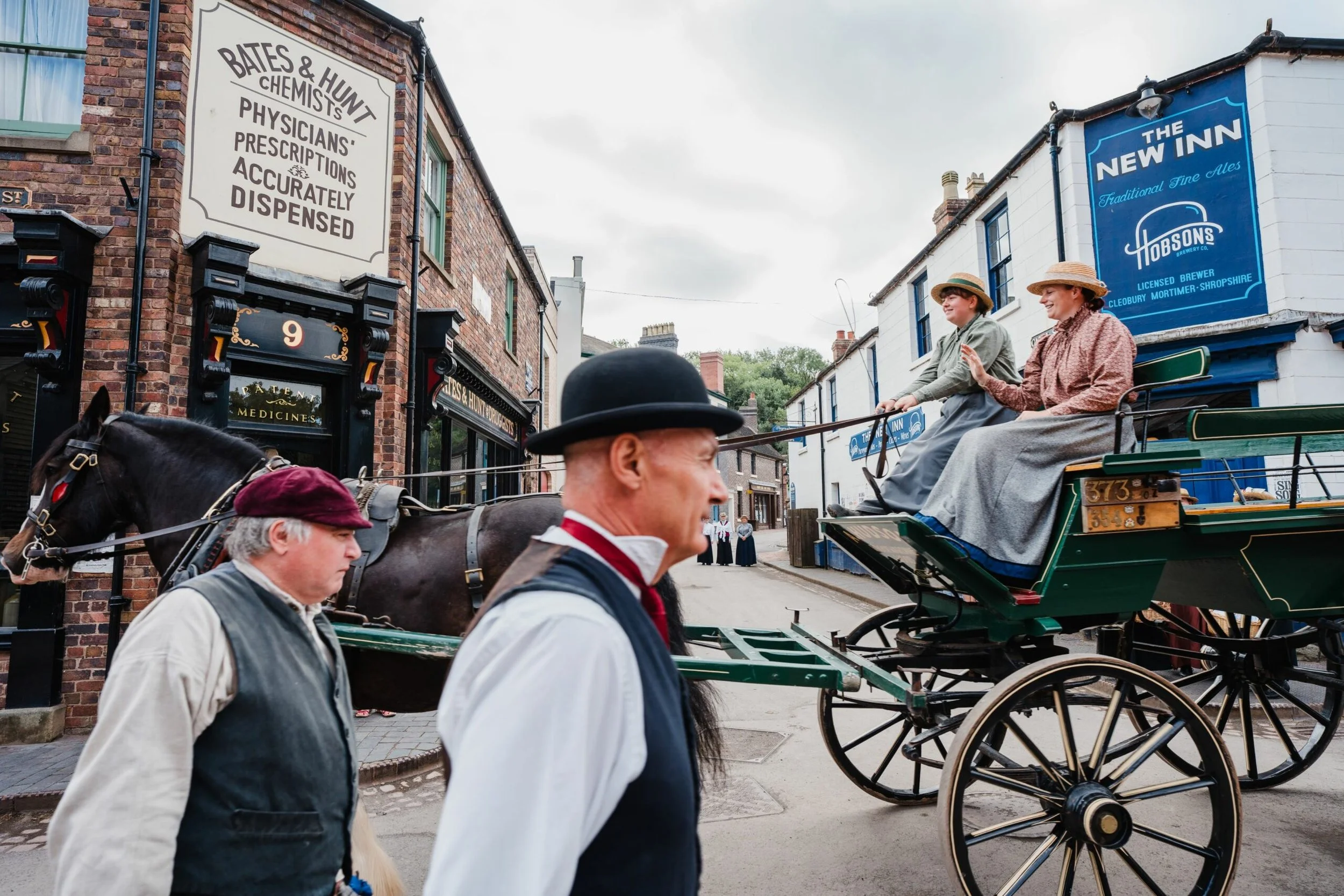 A-street-with-horse-chariot-and-gentlemen-walking-at-Blists-Hill-Victorian-Town-09-23-scaled.jpg
