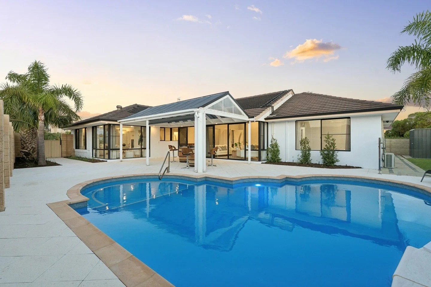 REFINED ELEGANCE

15 Beaumarks Court, Mindarie

🛏 5 Bed
🛁 2 Bath
🚗 2 Garage
🏊 Pool

A statement of coastal elegance, defined by architectural lines, soft neutrals and sleek black accents.

Sunlit interiors spill effortlessly to a glistening pool 