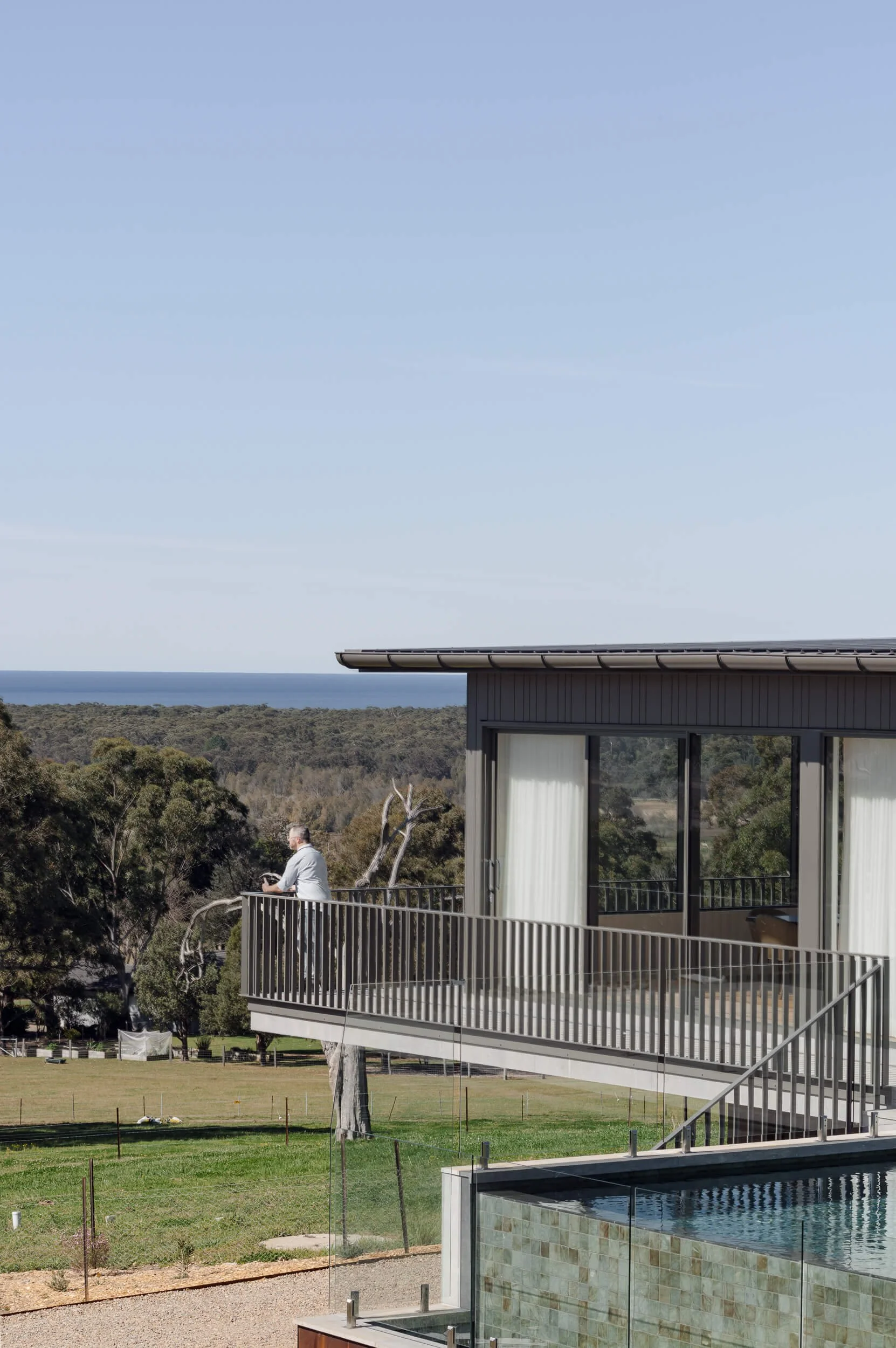 Cantilevered deck engineering at Seven Mile. Premium architectural photography and film documenting an off-grid custom build by QBC Constructions in Regional NSW.