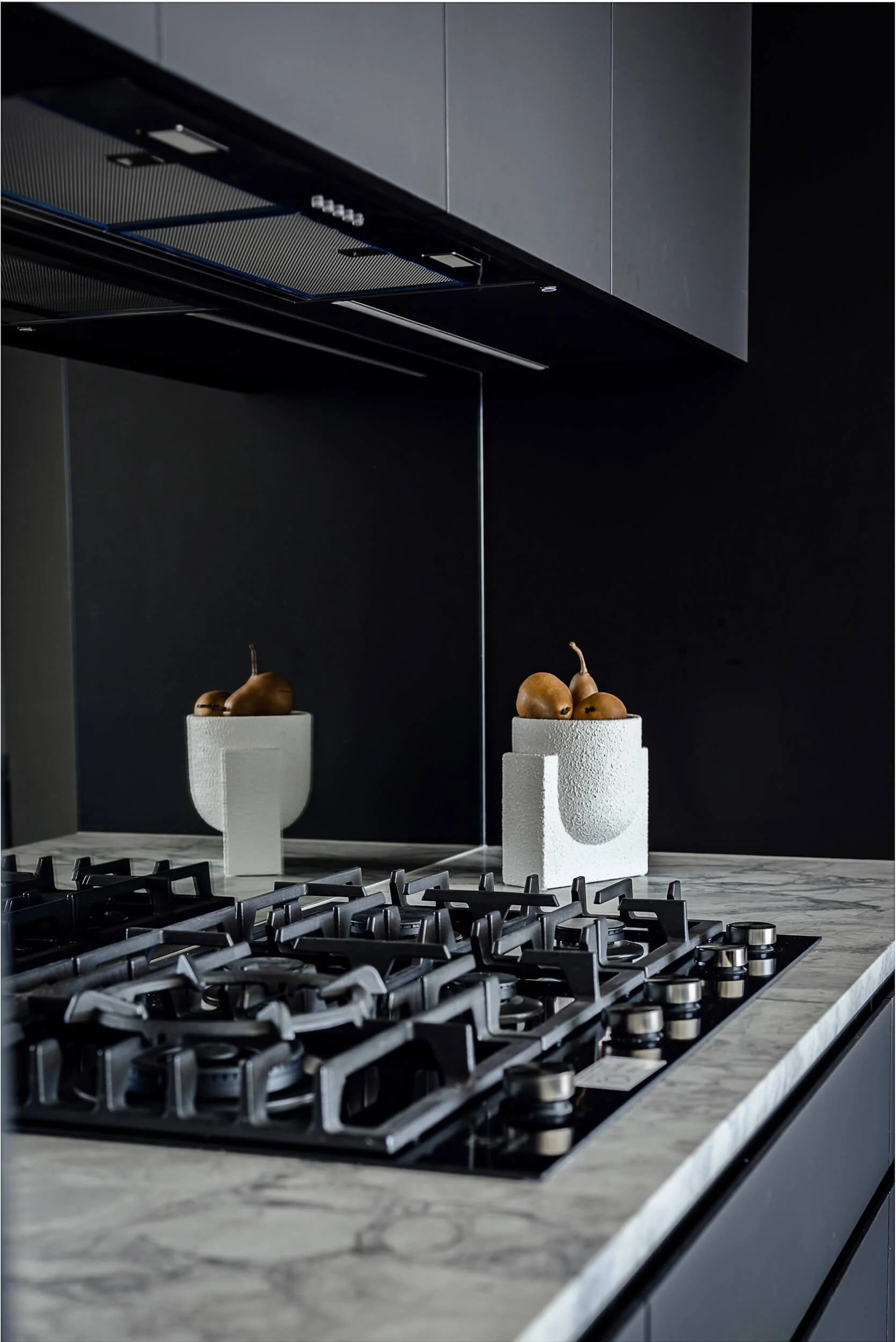 Premium architectural photography and film documenting true materiality and craftsmanship—highlighting reflective mirror splashbacks and detailed joinery execution—for Master Builders and designers in Regional NSW.