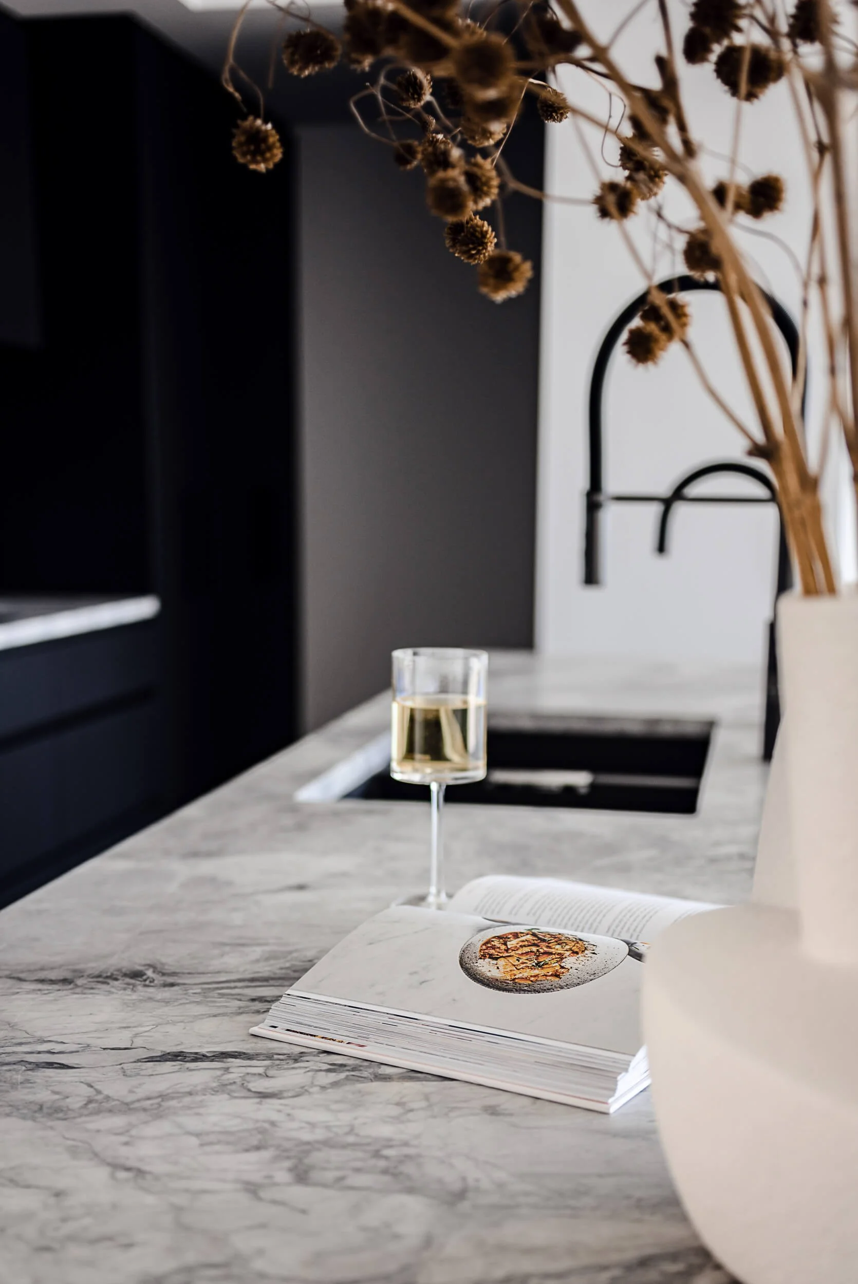 Premium architectural photography and film documenting true materiality and craftsmanship—highlighting matte black tapware and custom marble stonework—for Master Builders and designers in Regional NSW