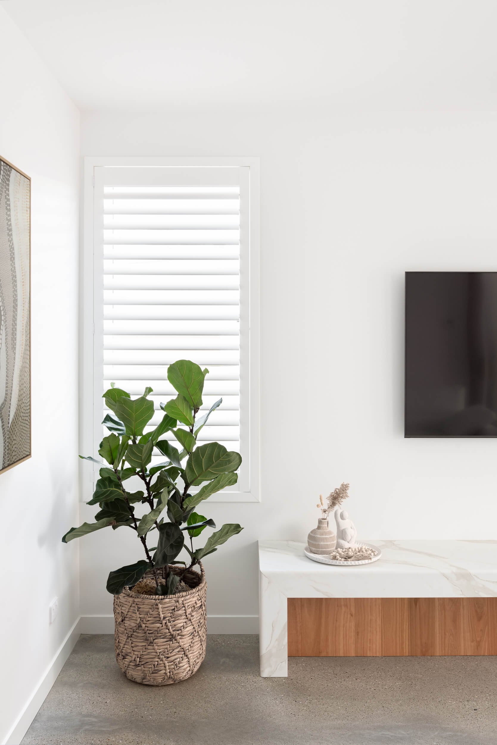Custom marble and timber joinery with coastal interior styling at Pacific 5. Premium architectural photography and film documenting true materiality, spatial flow, and craftsmanship for Master Builders and designers in Regional NSW.