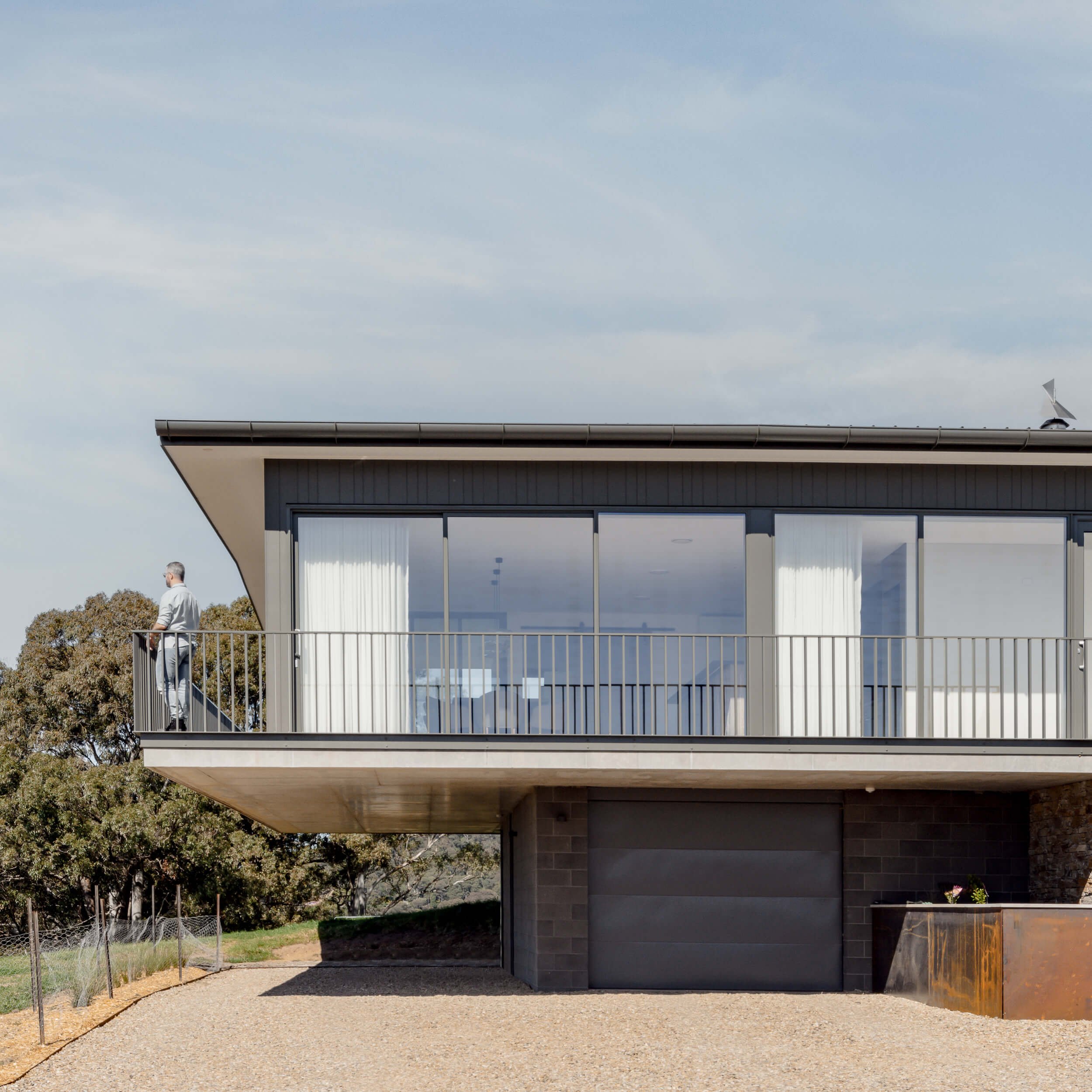 Cantilevered deck engineering at Seven Mile. Premium architectural photography and film documenting an off-grid custom build by QBC Constructions in Regional NSW.
