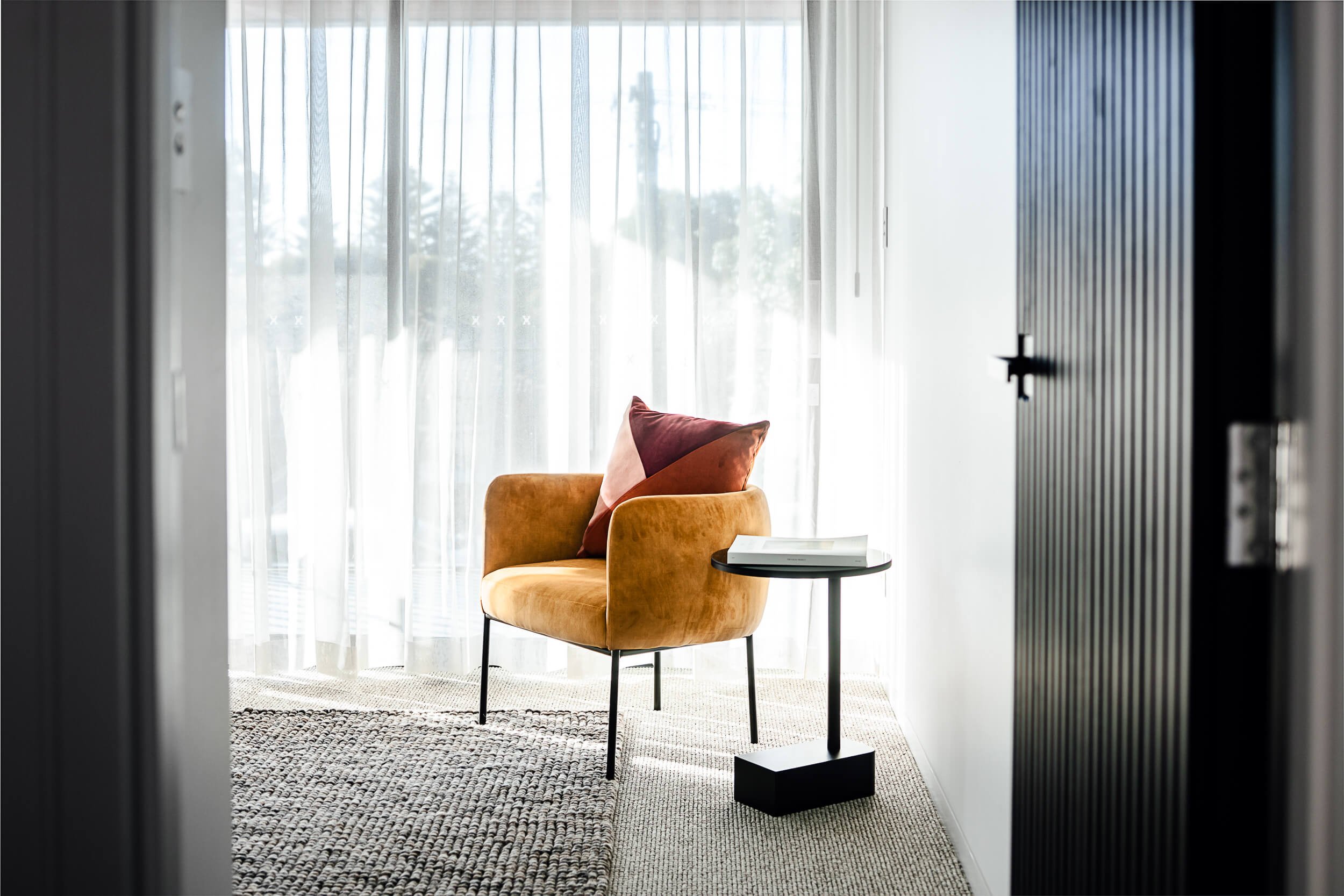 Premium architectural photography and film documenting true materiality and craftsmanship—highlighting interior joinery and natural light filtration—for Master Builders and designers in Regional NSW.