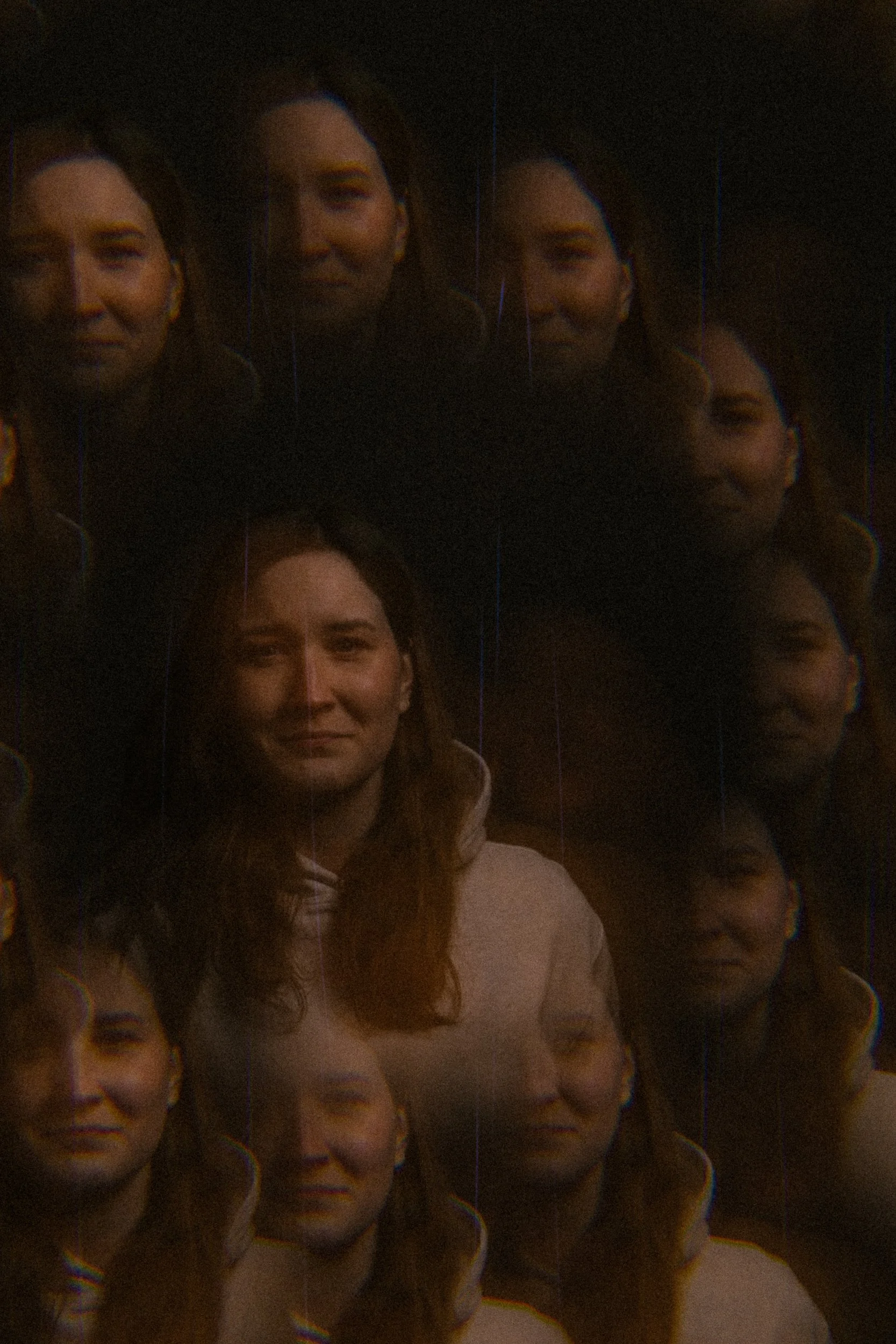 Multiple elongated, distorted images of the same woman, creating a layered, trailing visual effect.