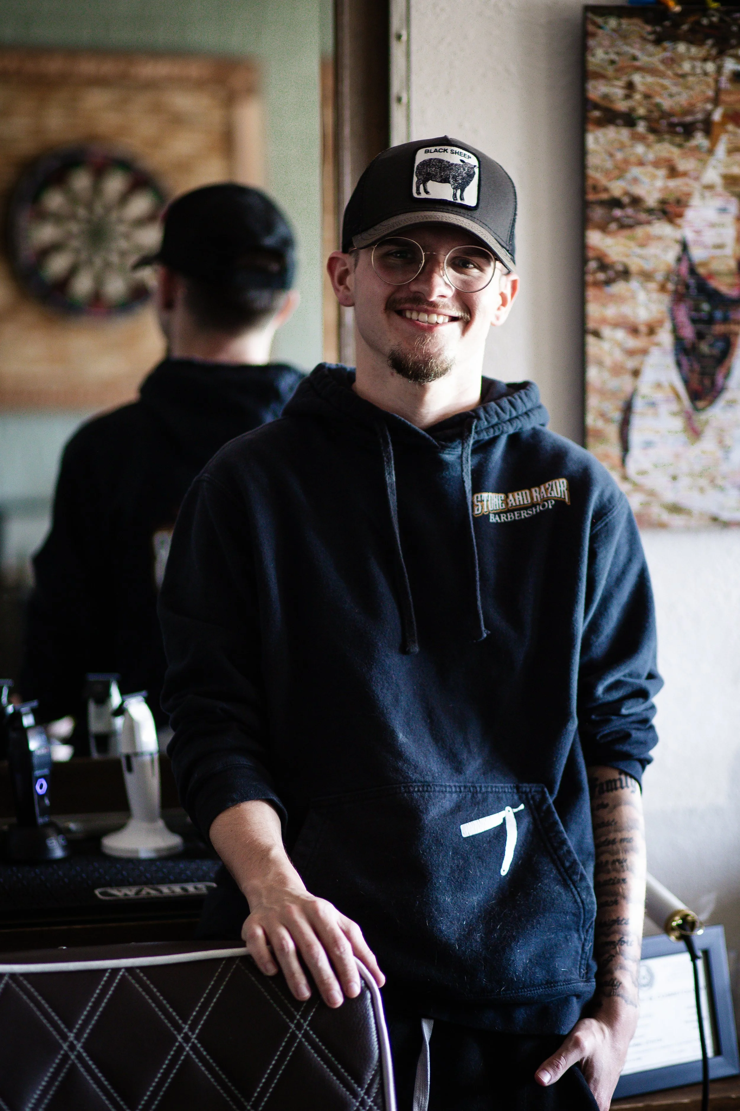 Dakota the barber at Stone and Razor Barbershop in Burleson, Texas