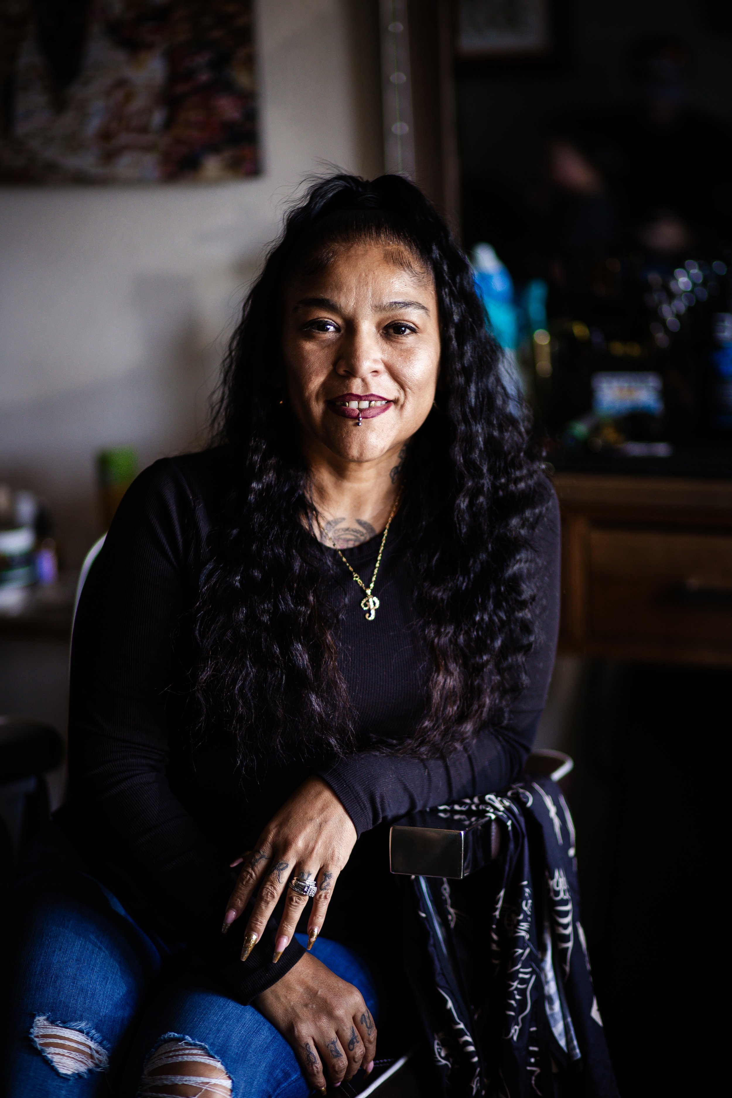 Pilar the barber at Stone and Razor Barbershop in Burleson, Texas