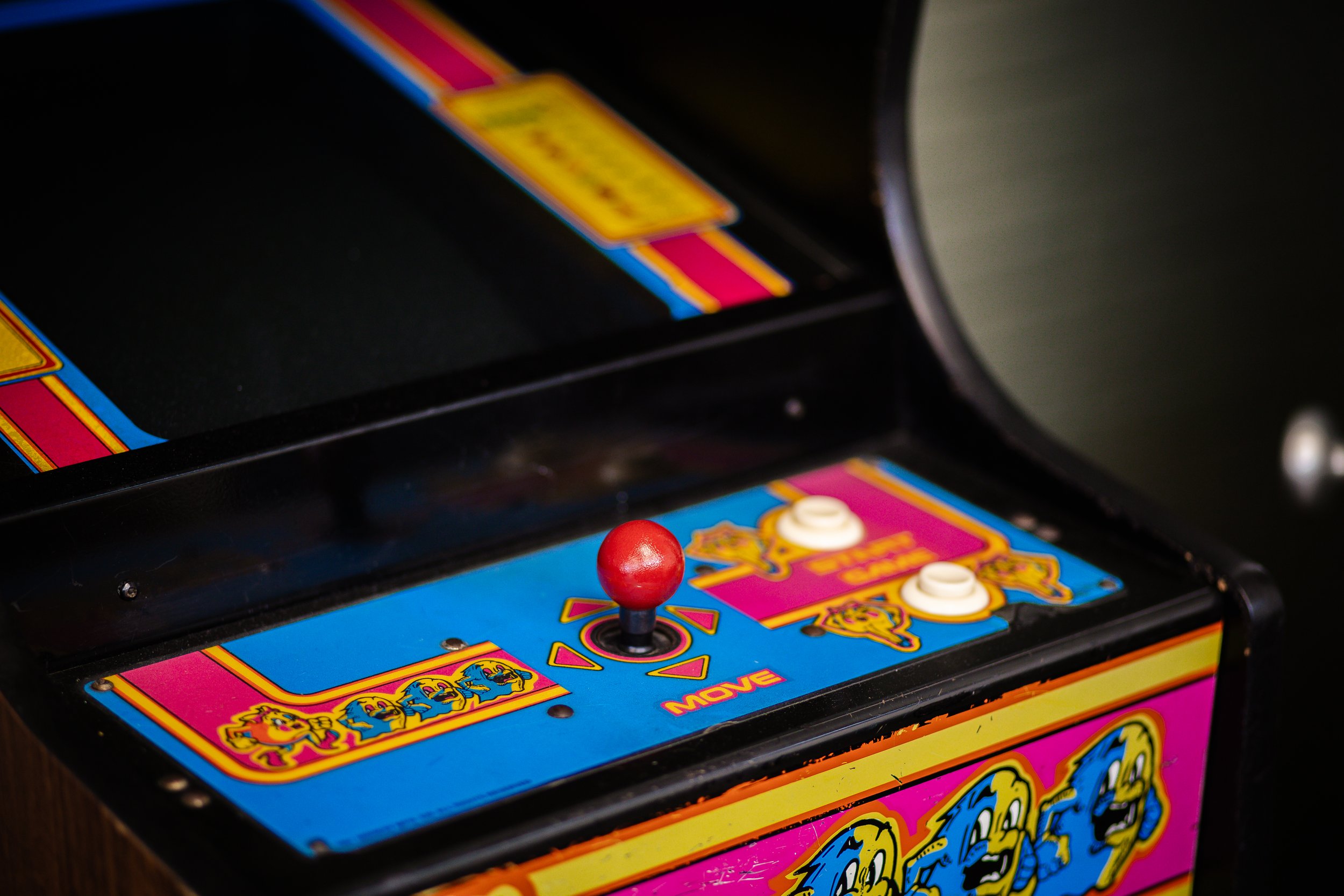 Vintage Pac-Man machine at Stone and Razor Barbershop in Burleson, Texas