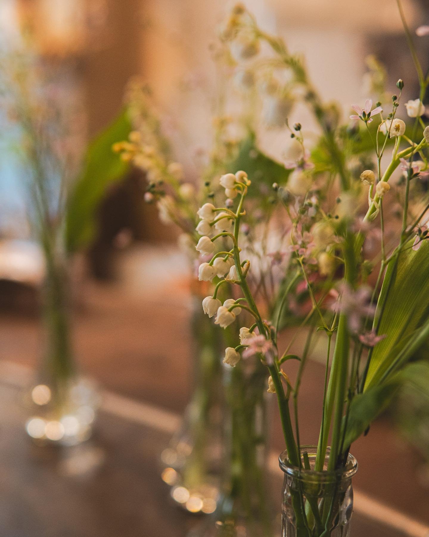 Lily of the valley stems paired with pink forget me nots🌿  Happy May 1st!