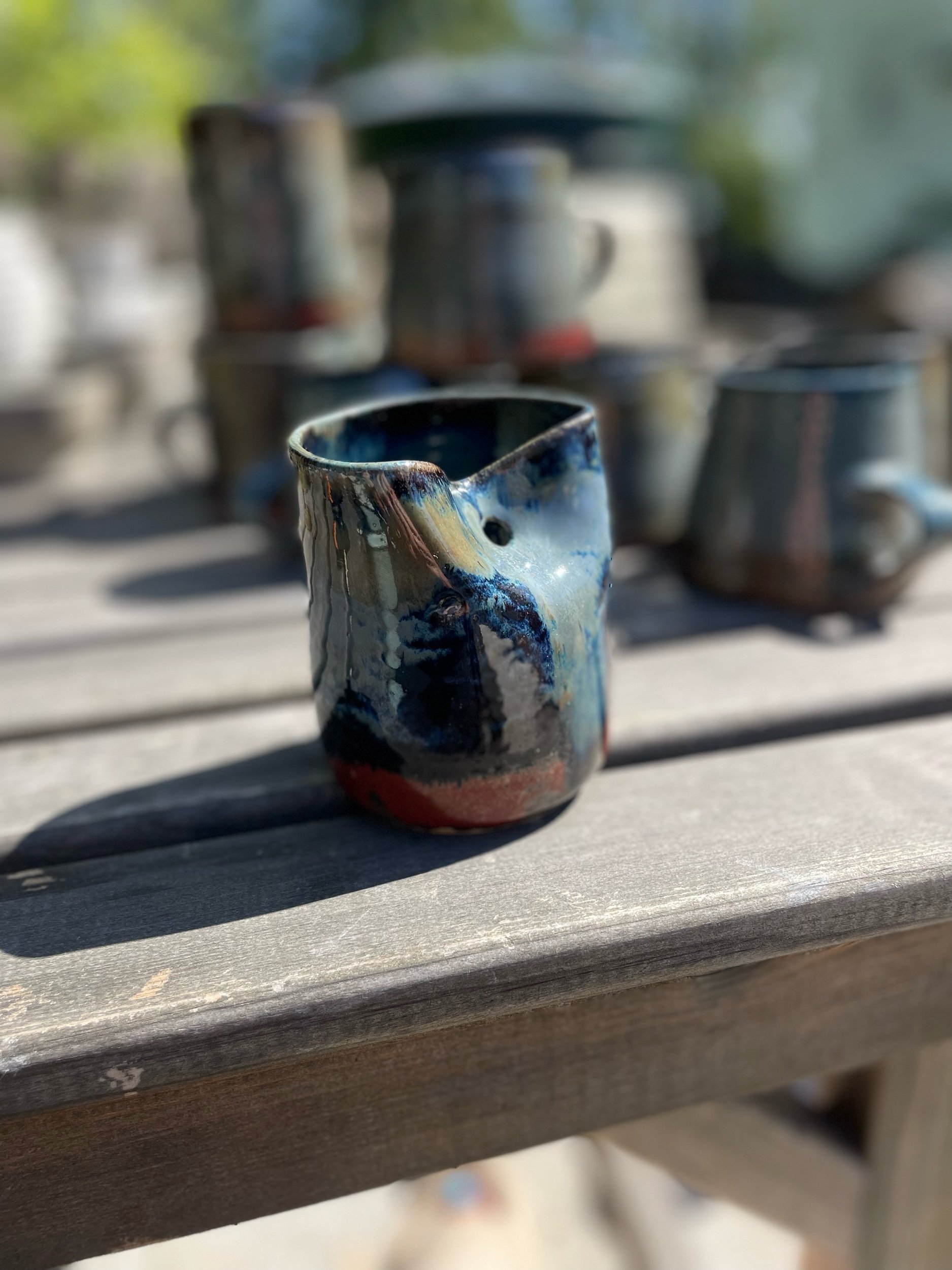 Beautiful iced coffee cup in midnight sky glaze