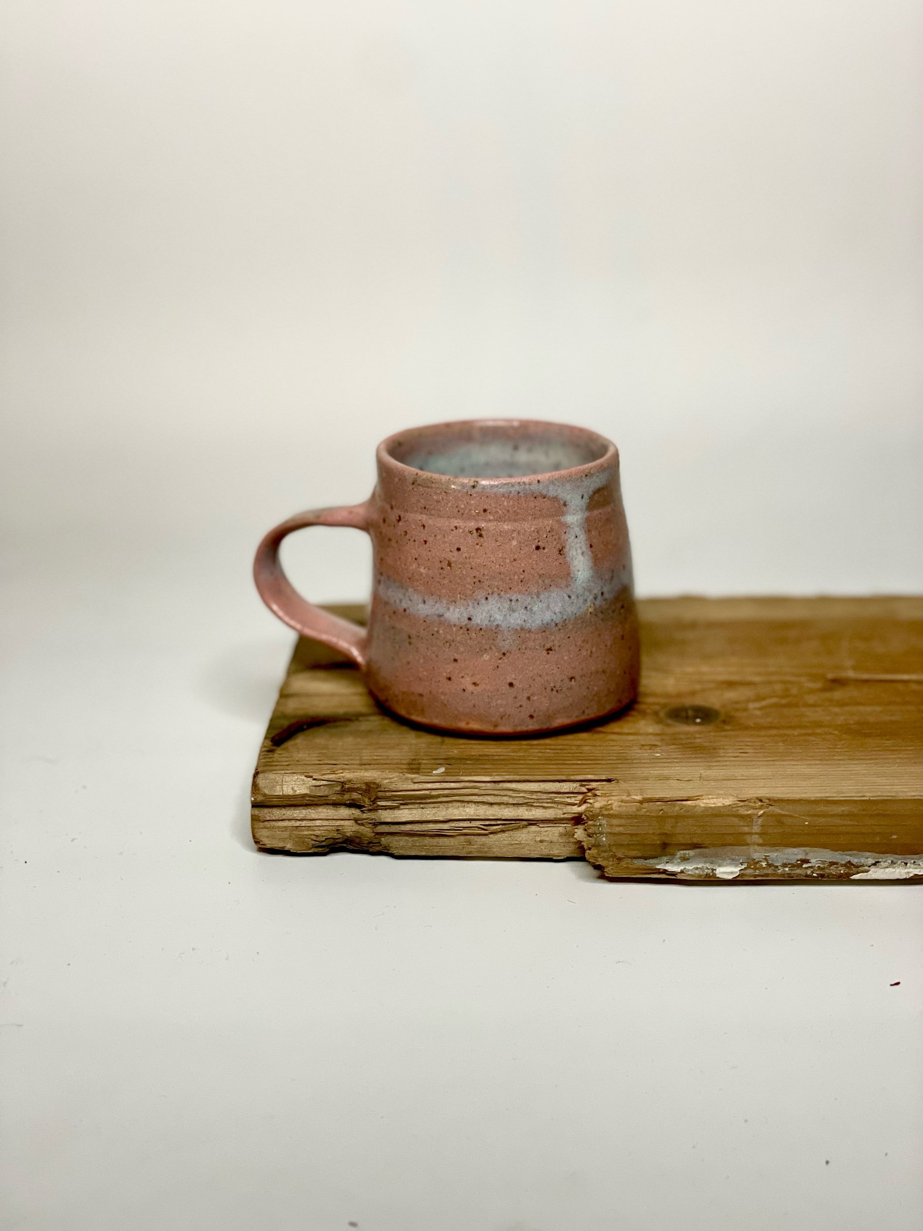 Small cup in pink sky glaze