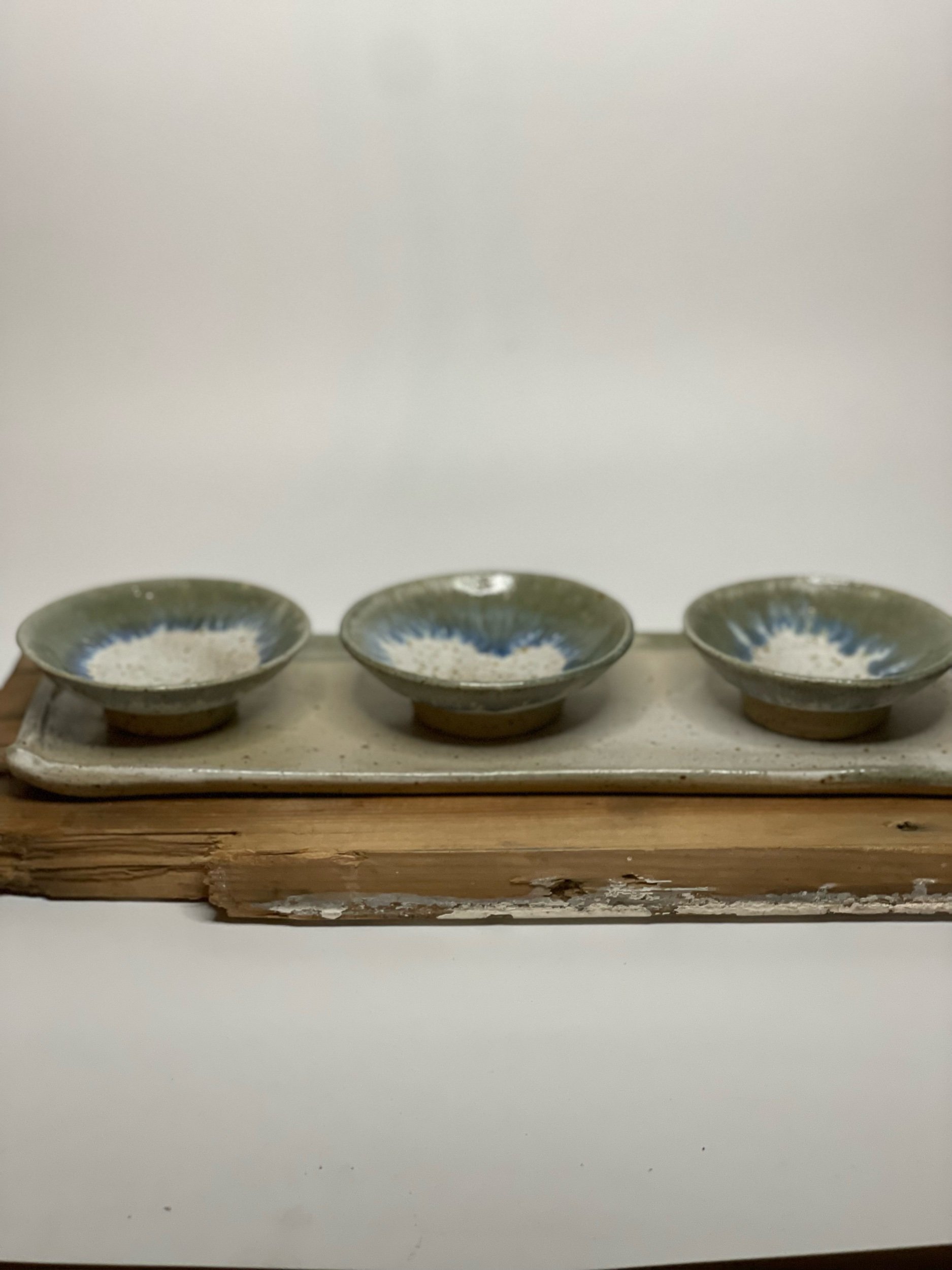 Trio of dipping bowls on tray