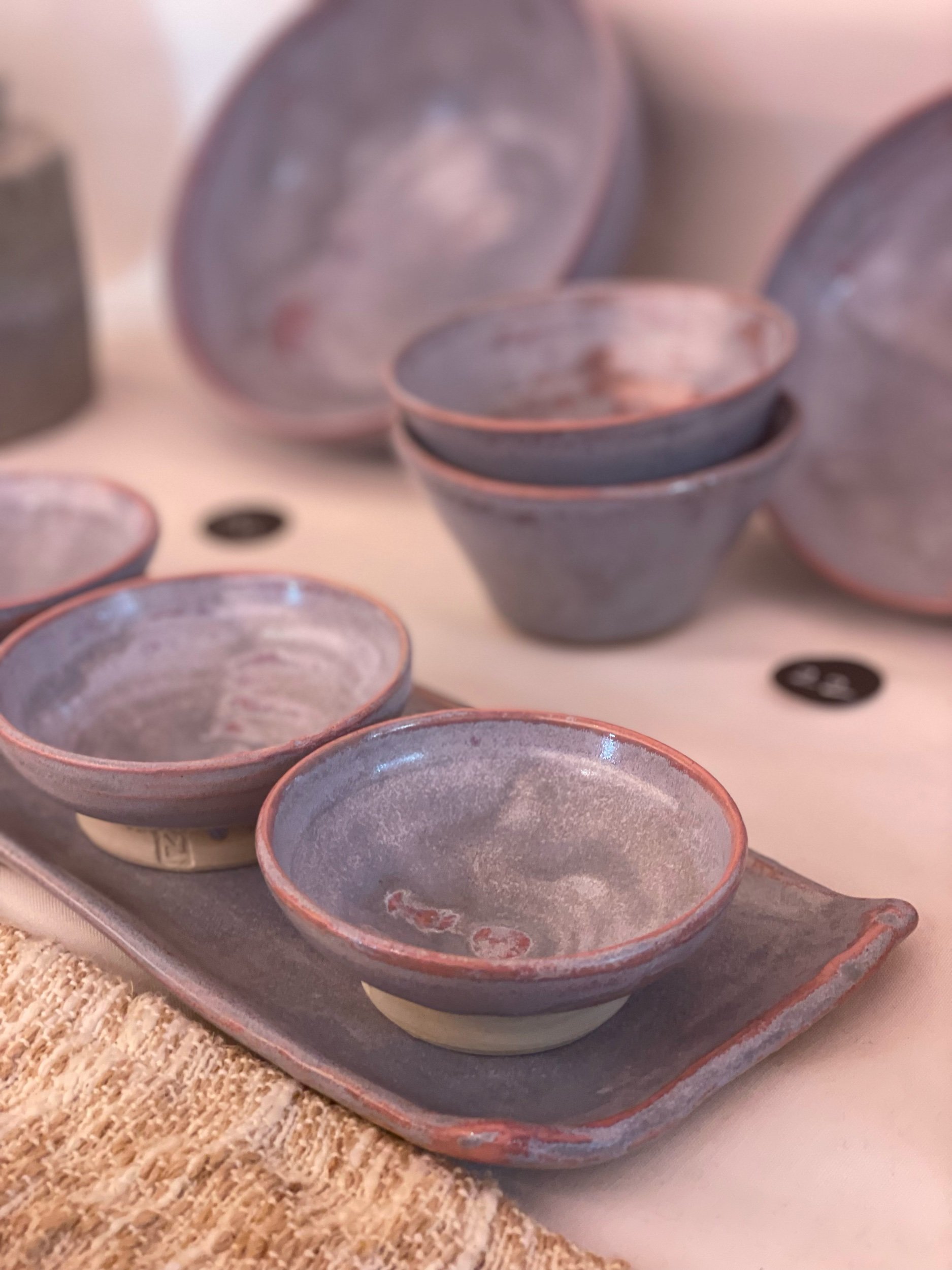 Close up of trio of dipping bowls on tray