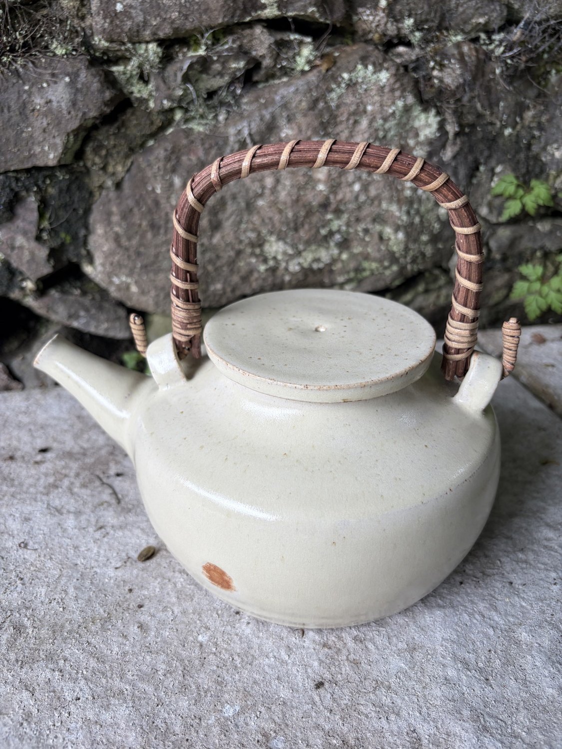 Handmade teapot in vanilla glaze