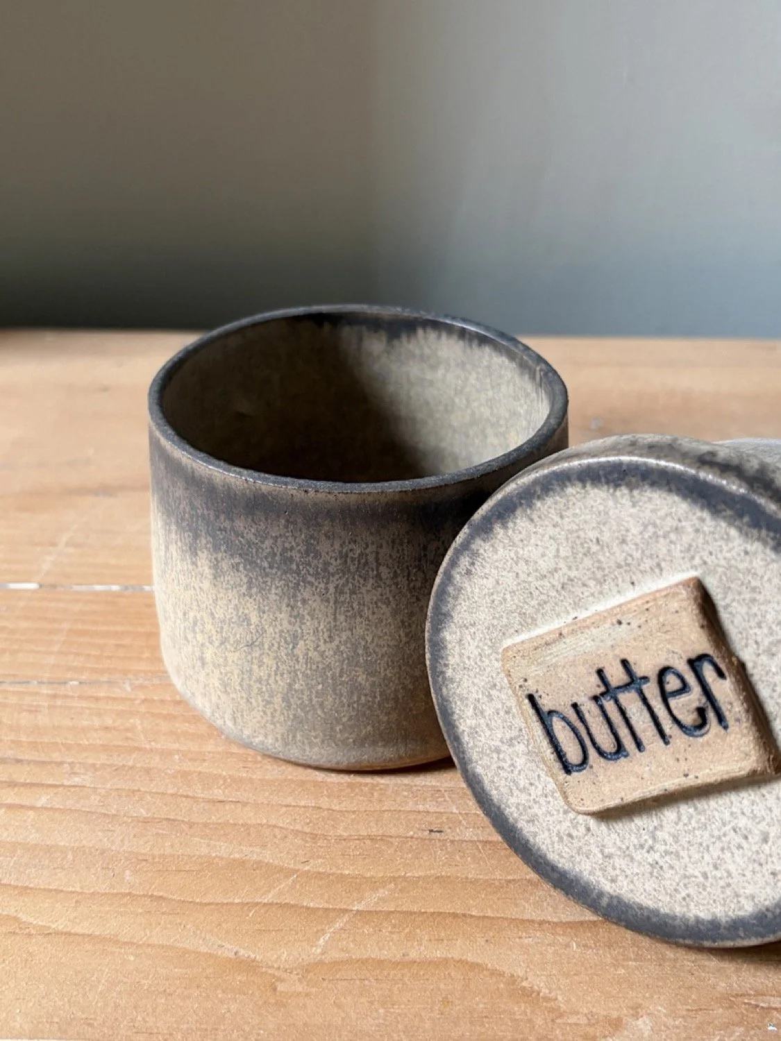 Handmade ceramic stoneware french butter press desert glaze image close up