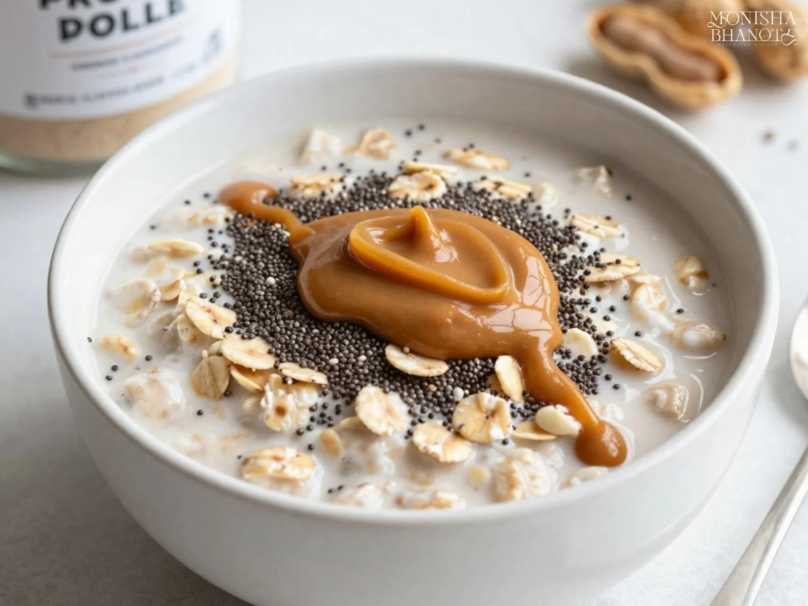 Dr. Monisha Bhanote's Peanut Butter Protein Overnight Oats topped with creamy peanut butter,