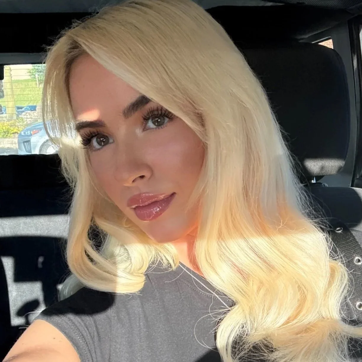 beauty professional at thallo beauty in wilkes-barre, pa, specializing in personalized hair, skin, and beauty services in a modern salon environment.