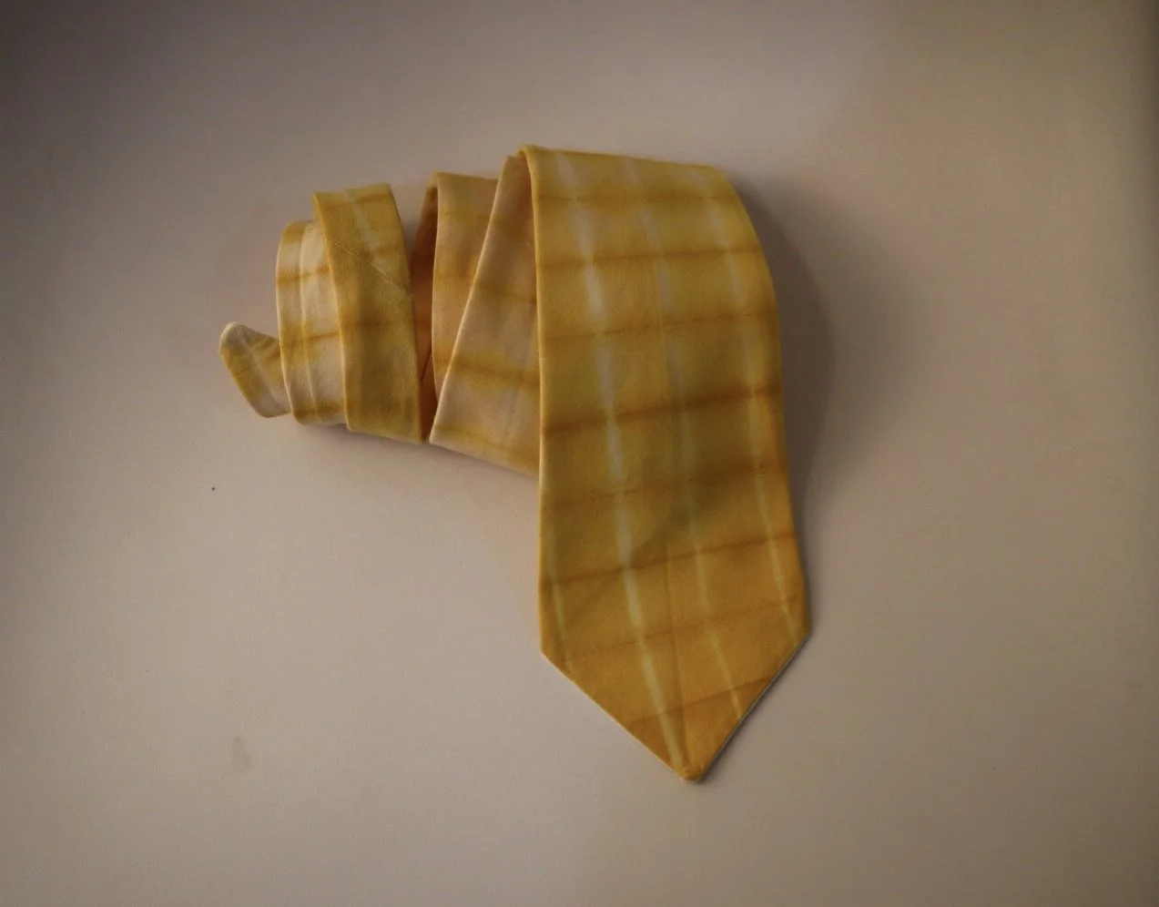  A necktie I sewed using cotton dyed with turmeric and onion skins 