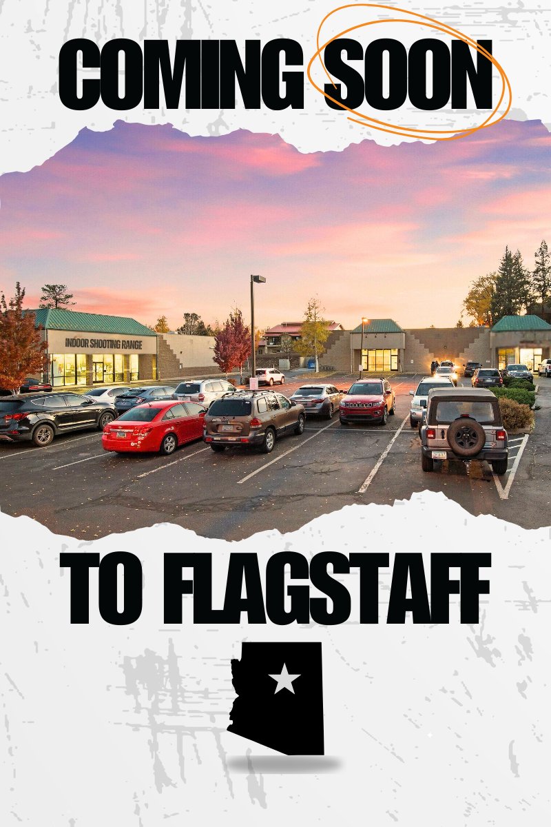 A parking lot in the early evening with multiple cars parked in front of a shopping center, with a sign indicating an indoor shooting range, and a sunset sky in the background. The image is overlaid with text that states "Coming Soon to Flagstaff" and includes a silhouette of the state of Arizona with a star.