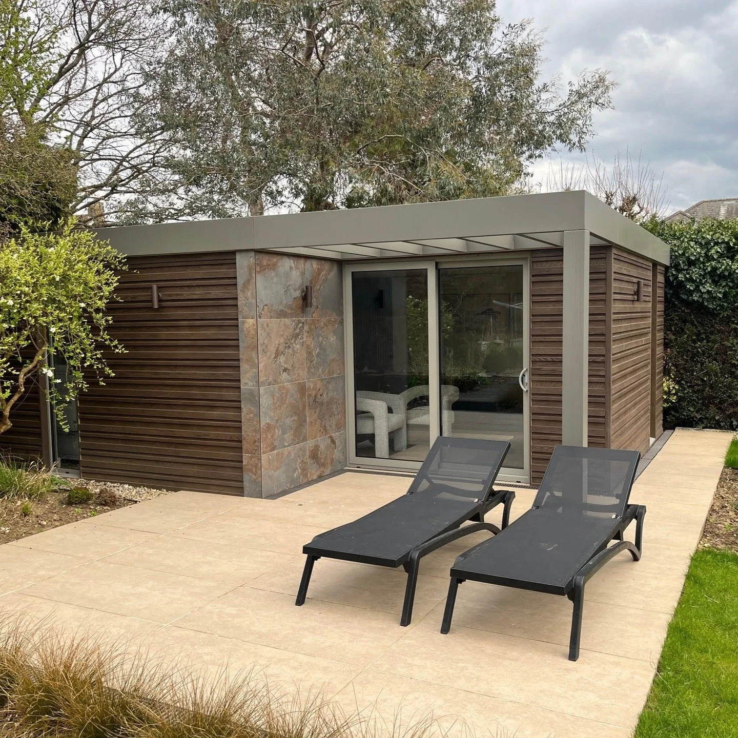 Custom-built home office, designed and finished to suit our customer&rsquo;s exact needs. A truly bespoke at-home design studio. 🏠✨

Specs: High-grade mineral roof and durable composite cladding | Premium porcelain tiling with a detailed marble patt