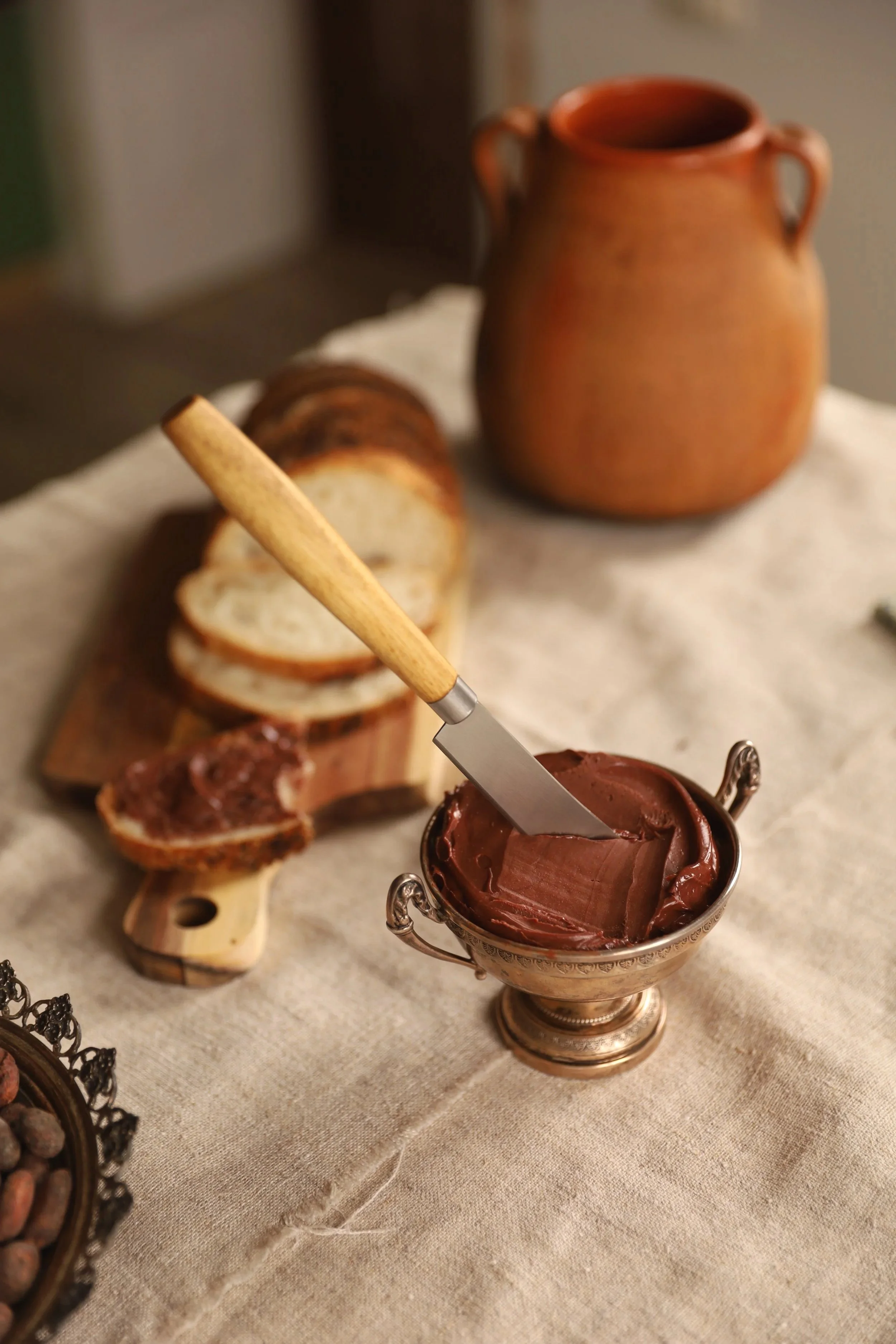 Chocolate butter in silver dish