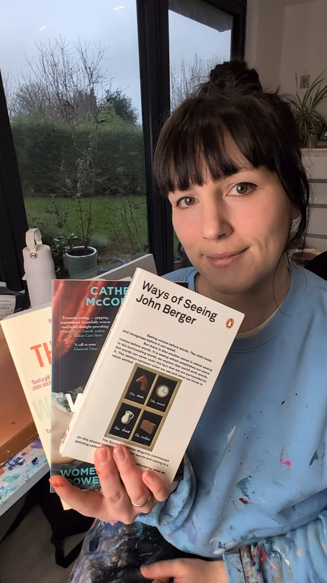 Artist showing book recommendations for art history