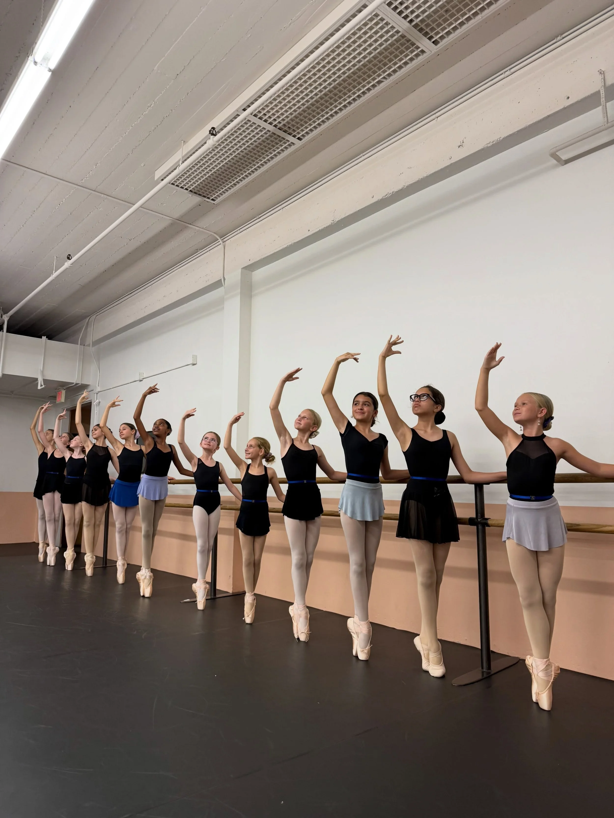 Congrats to the next generation of pointe shoe dancers! Some of these dancers are new to pointe in the last year and some started tonight. We also want to share Moira, who began her ballet journey as an adult in our Adult ballet program, has been put