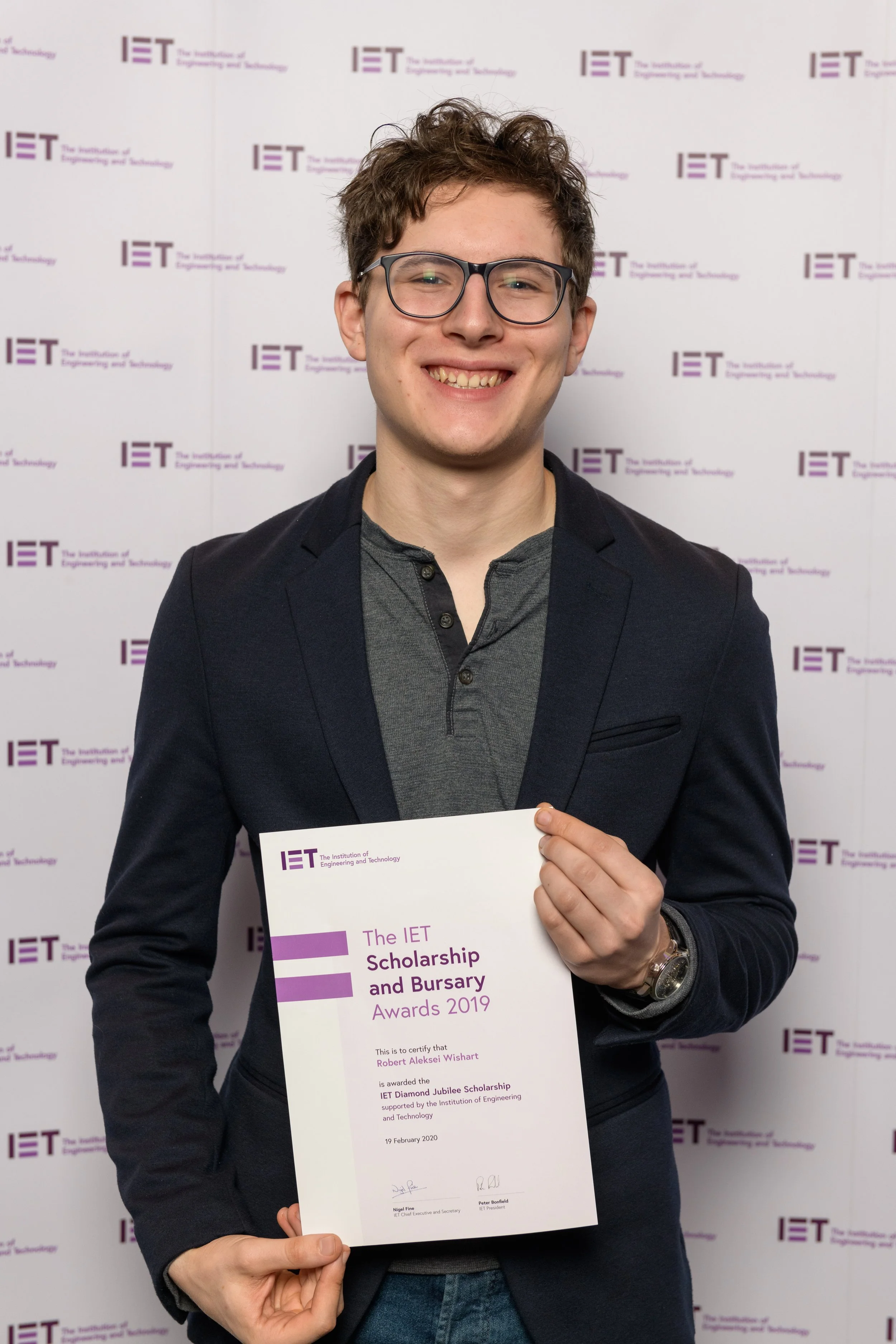 Photo from 2020 of me accepting my IET Diamond Jubilee Scholarship