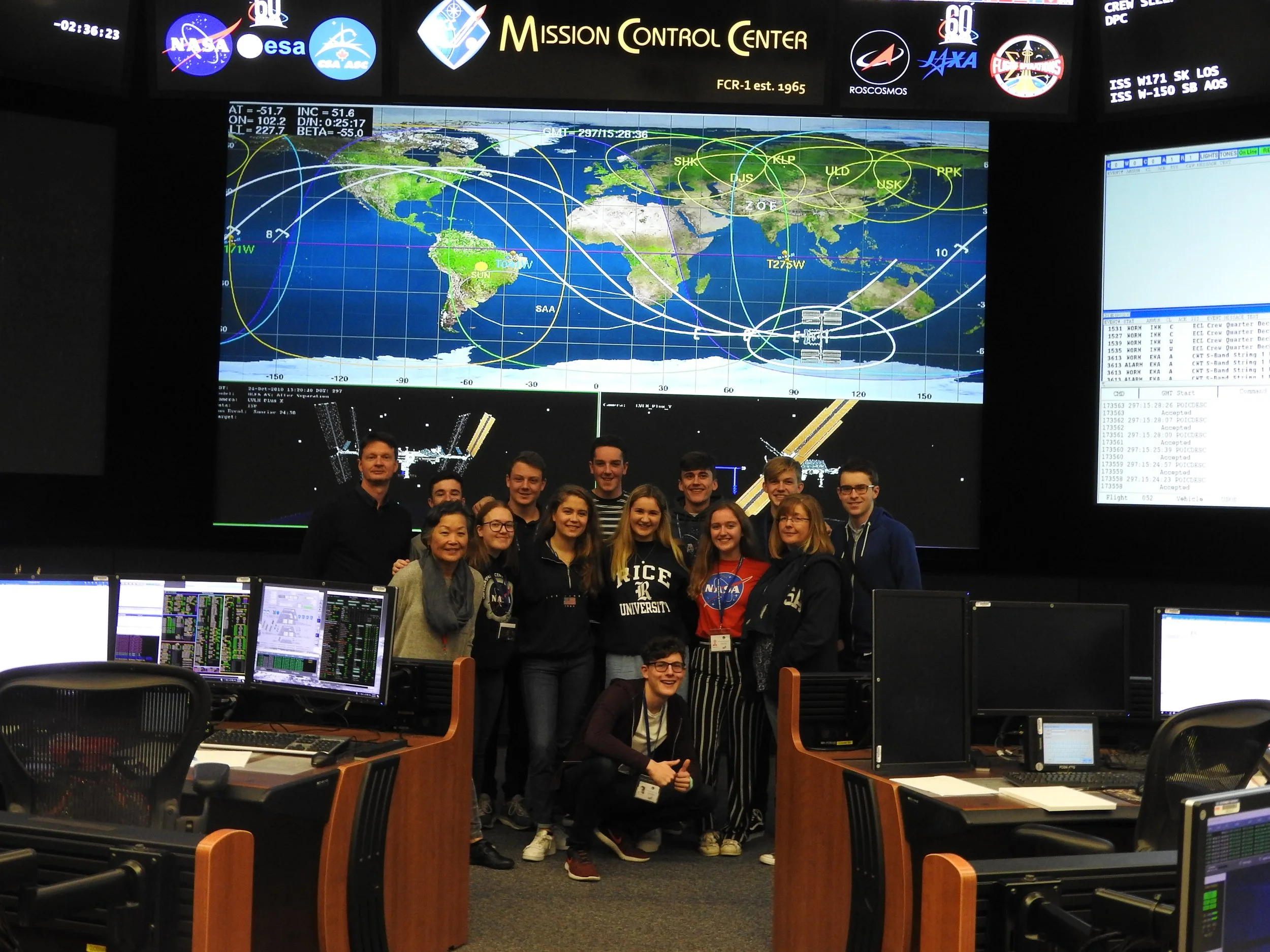 A photo of me and my fellow Space School alumni inside Mission Control at the Johnson Space Center