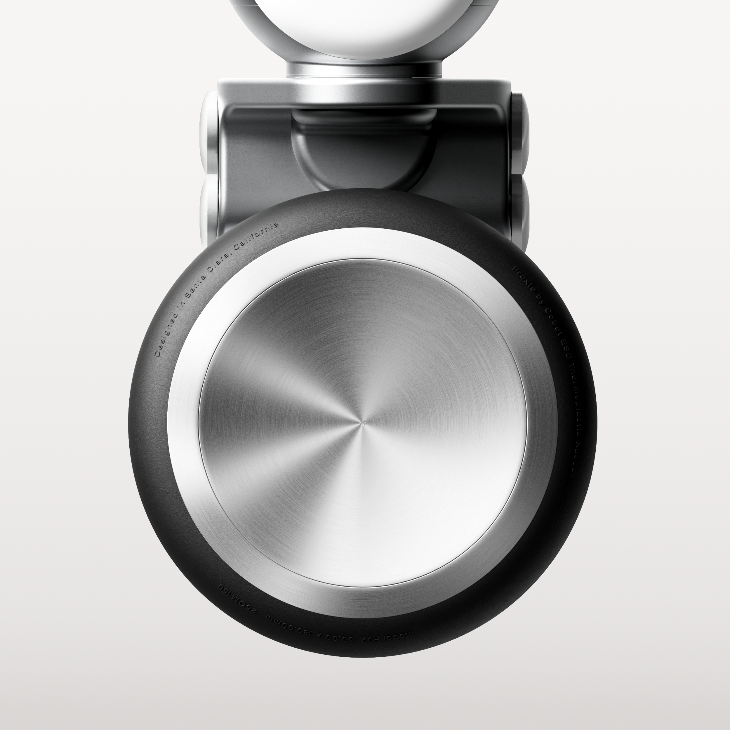 Close-up of a modern speaker with a metallic finish and black base, set against a plain white background.