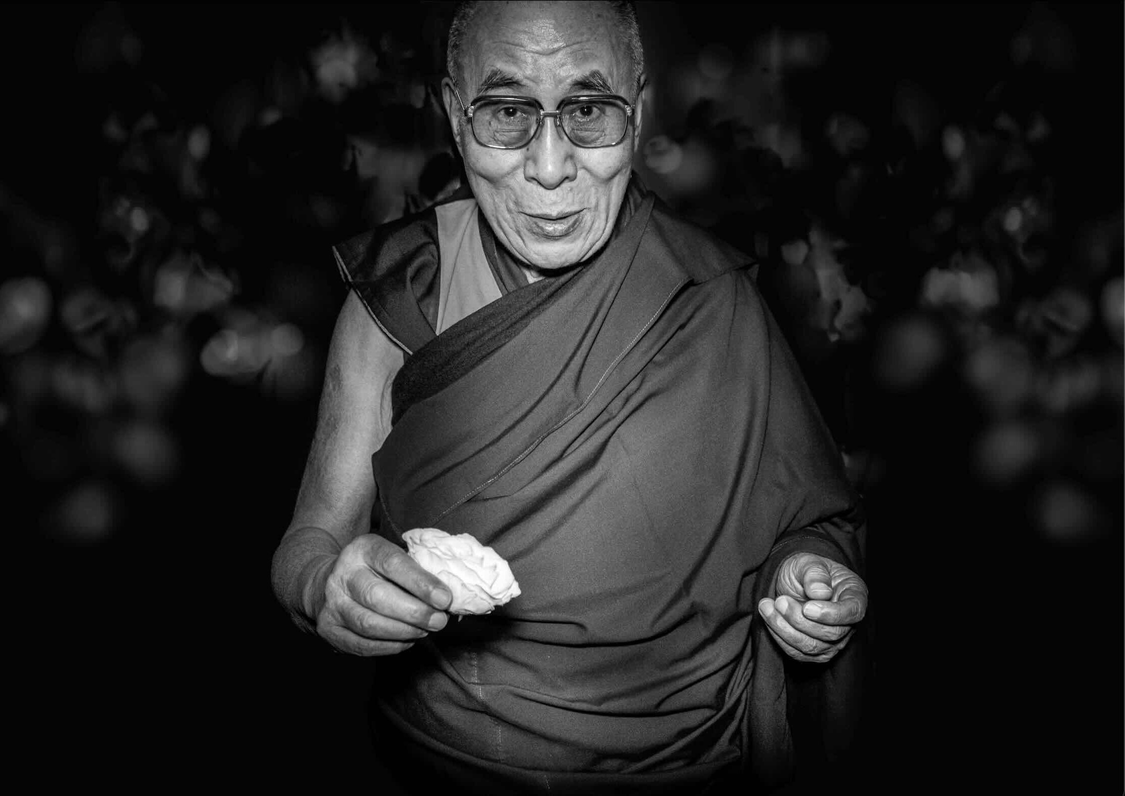dalai-lama-holding-peace-rose..jpg