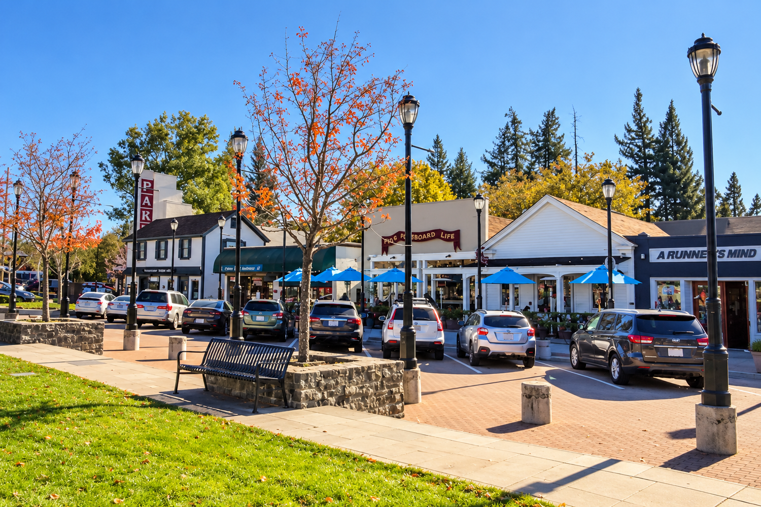 Shops and outdoor cafe tables in downtown Lafayette, California, on a sunny fall day
