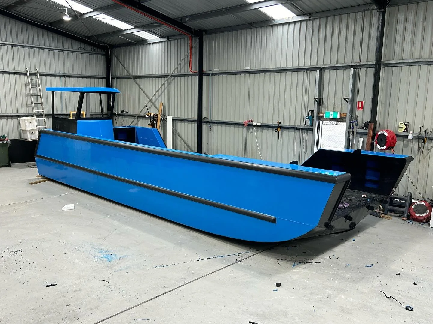 While the rest of us have been slacking off over Christmas.  Dale at Alumarine has been hard at work completing this 10m HDPE work boat.  Next week it will be transferred to the main Alumarine factory so that bow door, crane, windows and engines can 