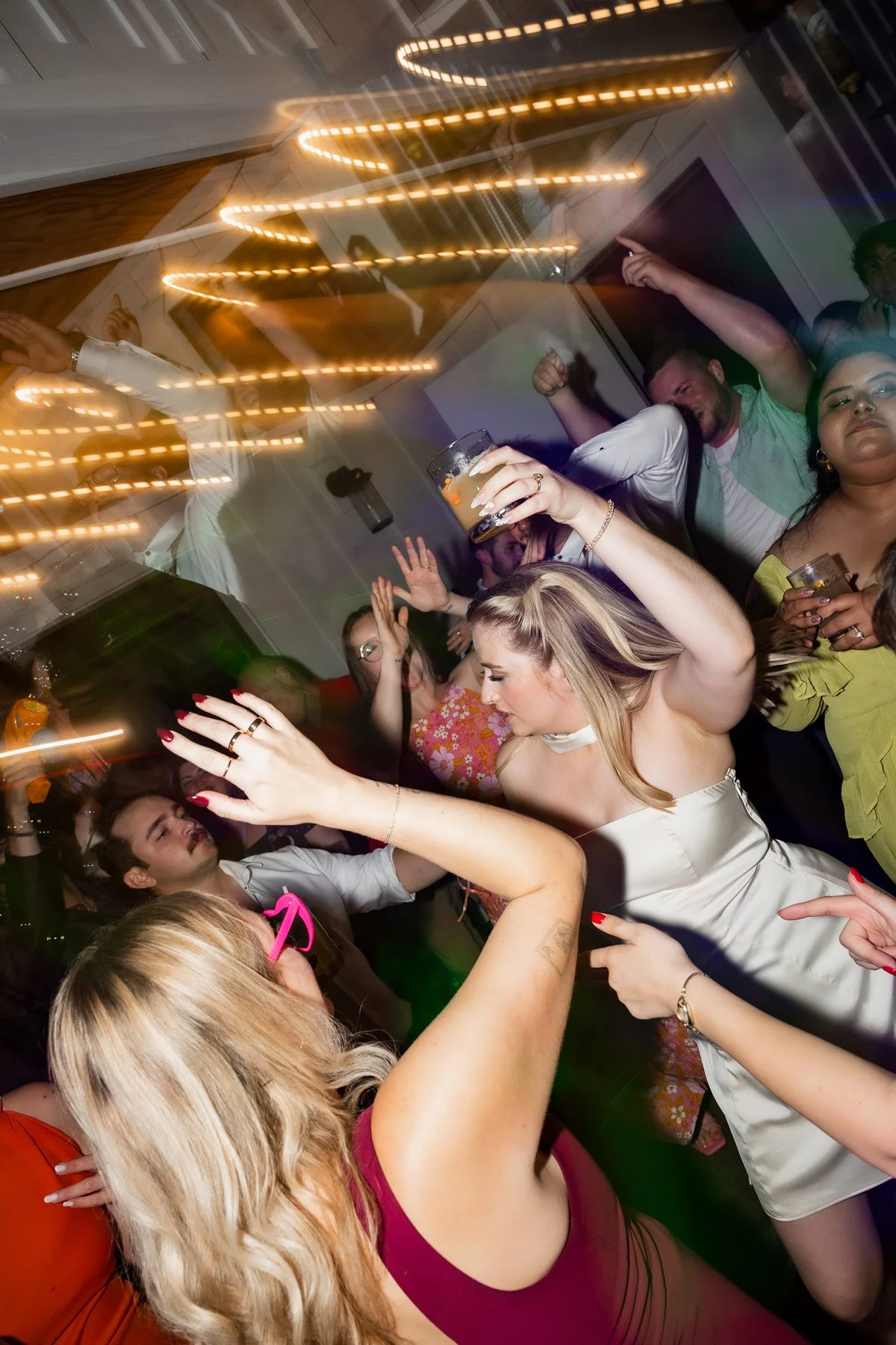 Women dancing at wedding reception