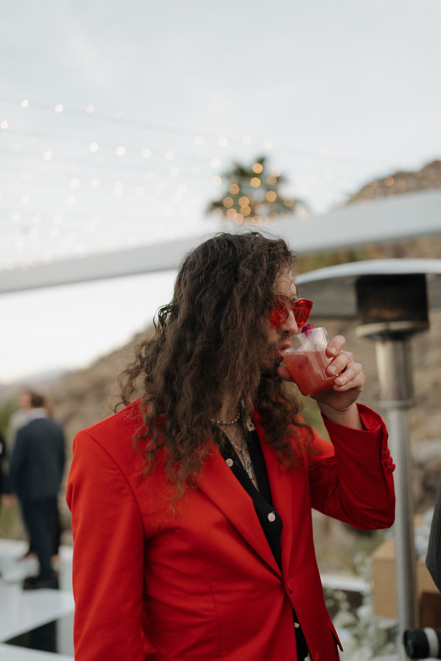 Guest enjoying a wedding cocktail by a Palm Springs mobile bartending service