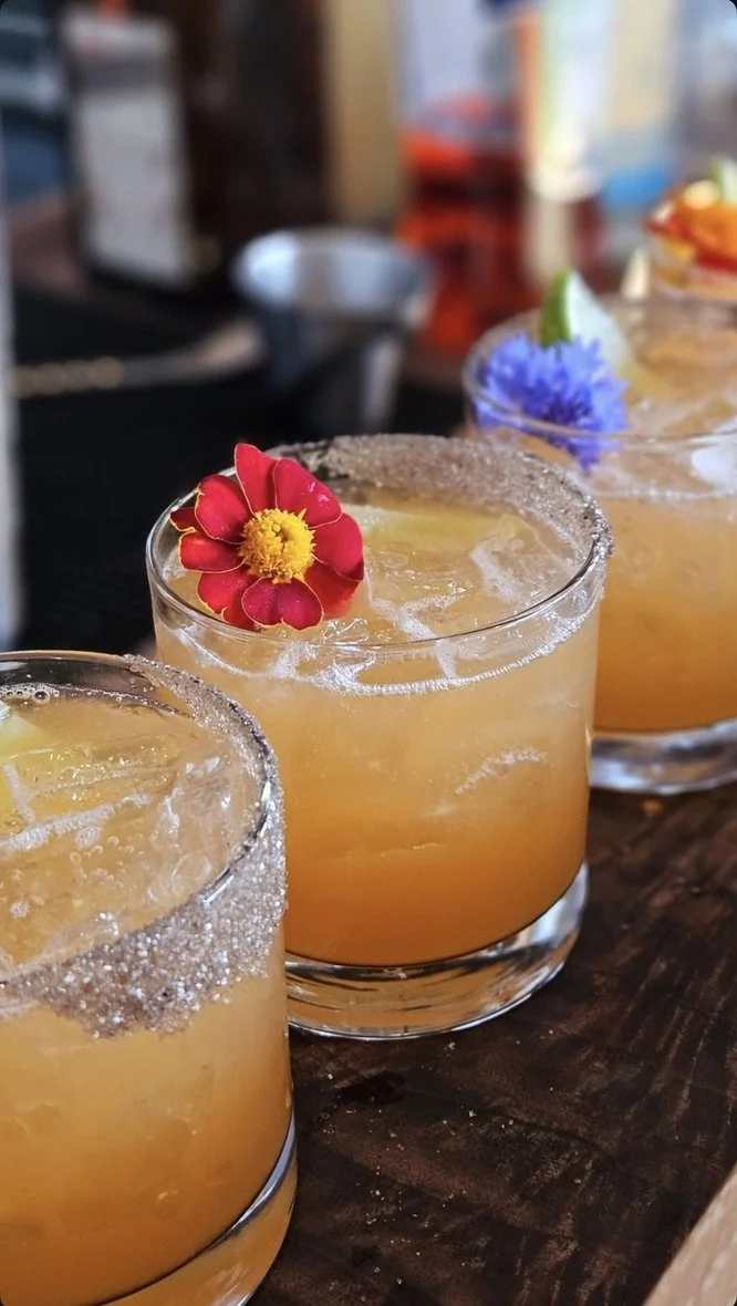 Orange craft cocktails prepared by Amaro Bartending, Palm Springs