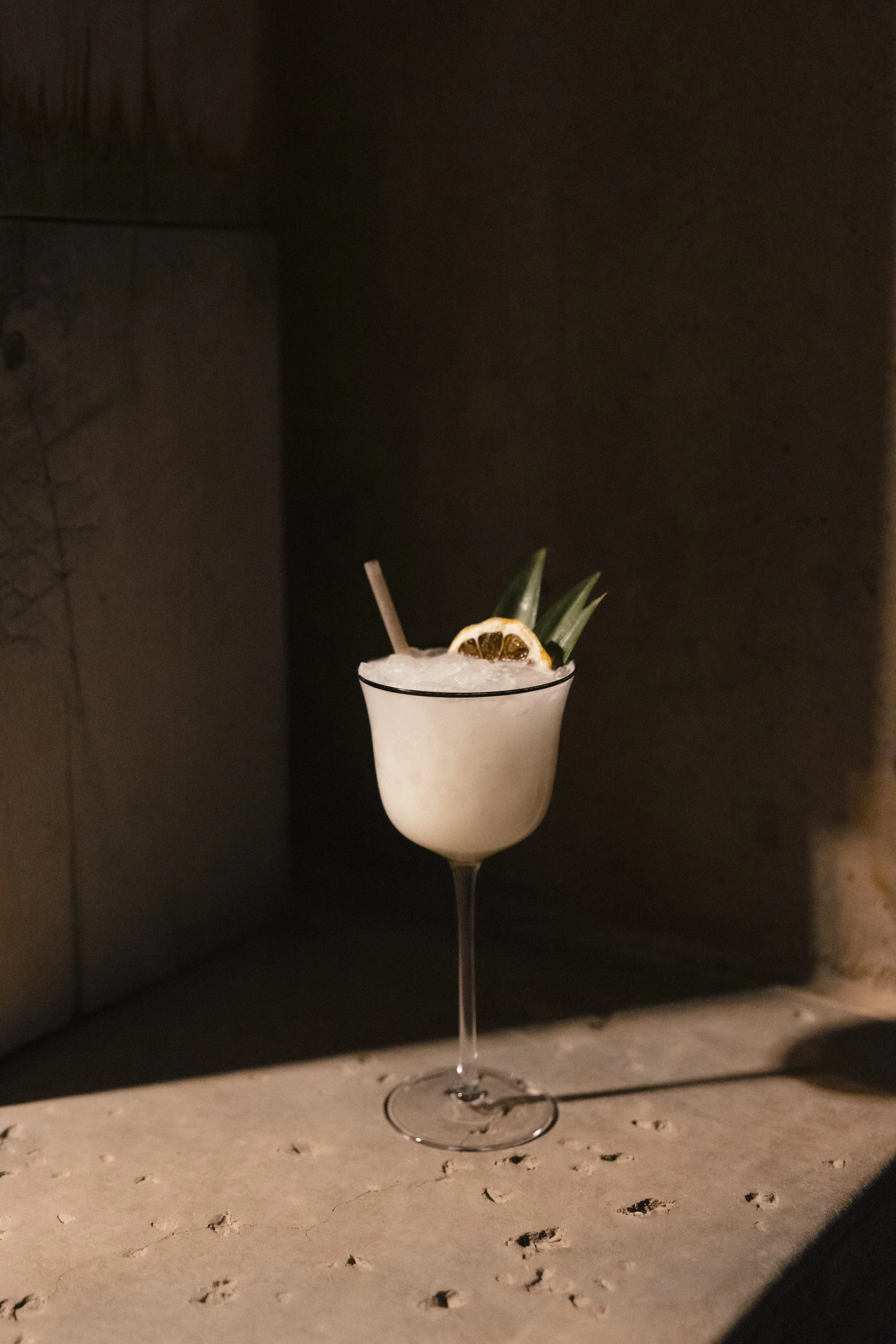 Dramatic lighting on a coconut margarita