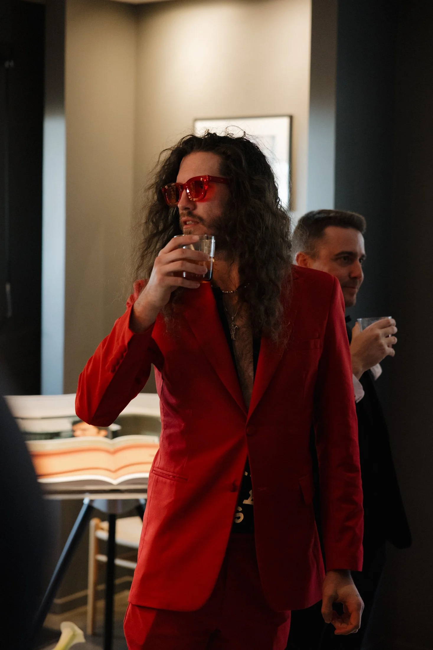 Man at wedding reception sipping cocktail crafted by private event bartenders in Palm Springs.