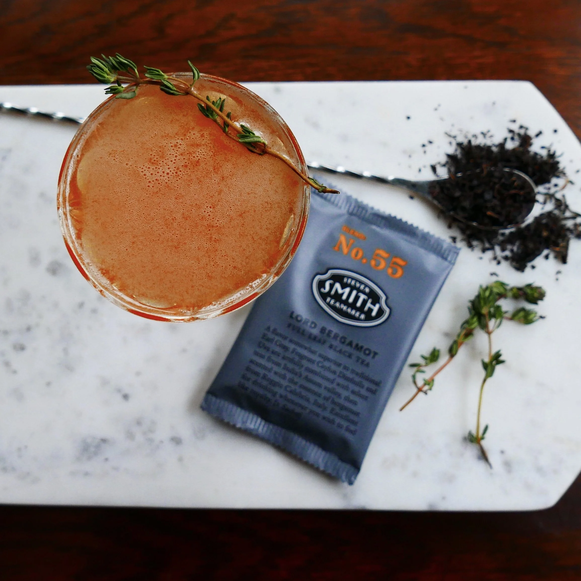 A garnished craft cocktail prepared by Amaro Bartending Palm Springs.