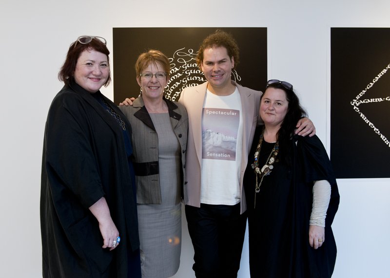   Heather Galbraith, Celia Wade-Brown, Christian Thompson and Ann Shelton at 8 Limbs exhibition opening, Te Whare Hēra Gallery . 2014. Photograph by Jane Wilcox. 