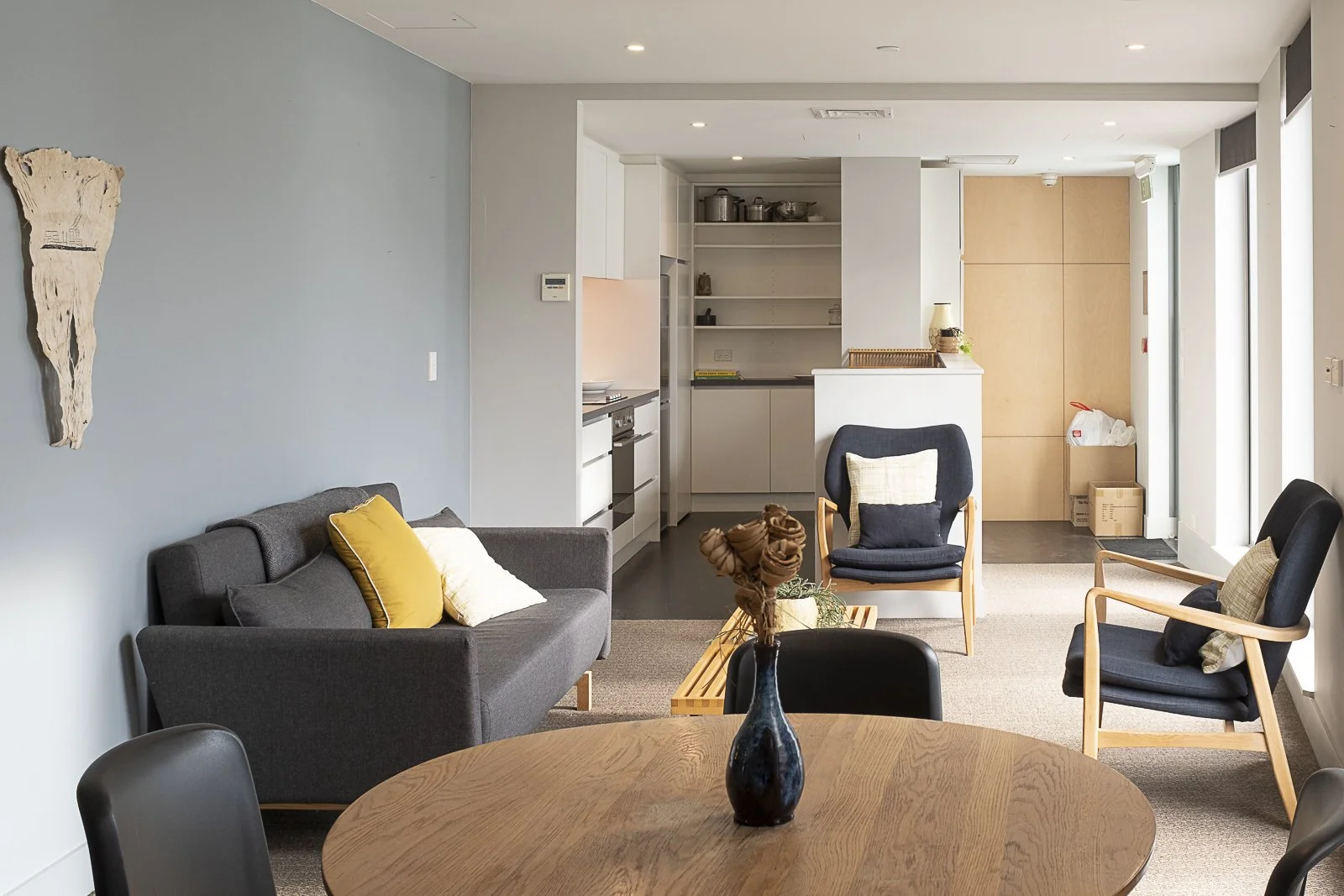 Living area leading into kitchen
