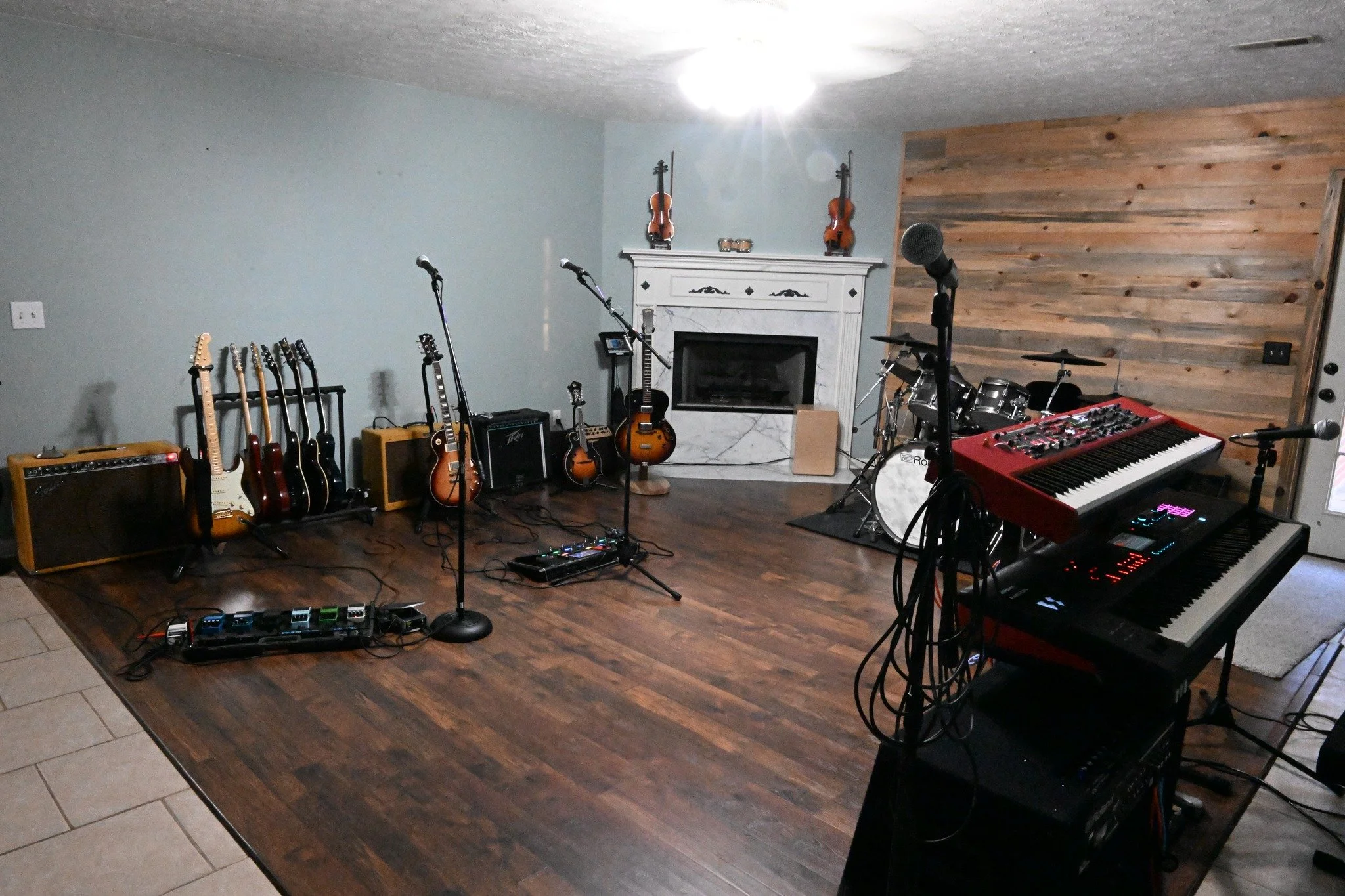 New Breed Productions recording studio tracking room with guitars, keyboards, drums and microphones near Nashville, Tennessee