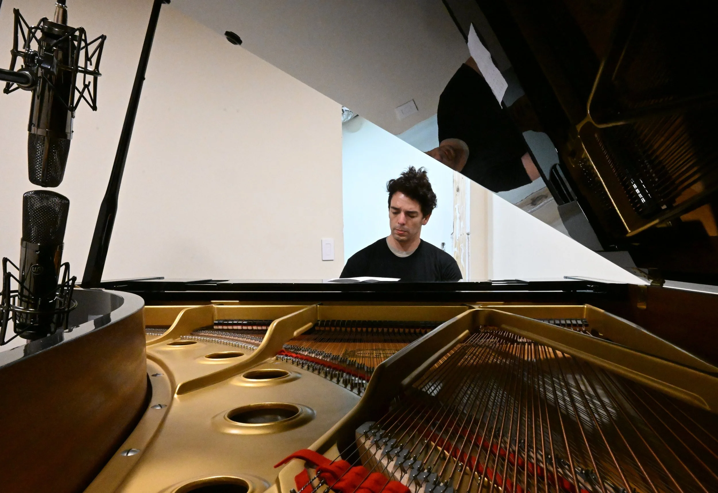 Recording Artist Sean Guerrero Playing our Yamaha C7 5.5 foot Grand Piano at New Breed Music Group Studio B