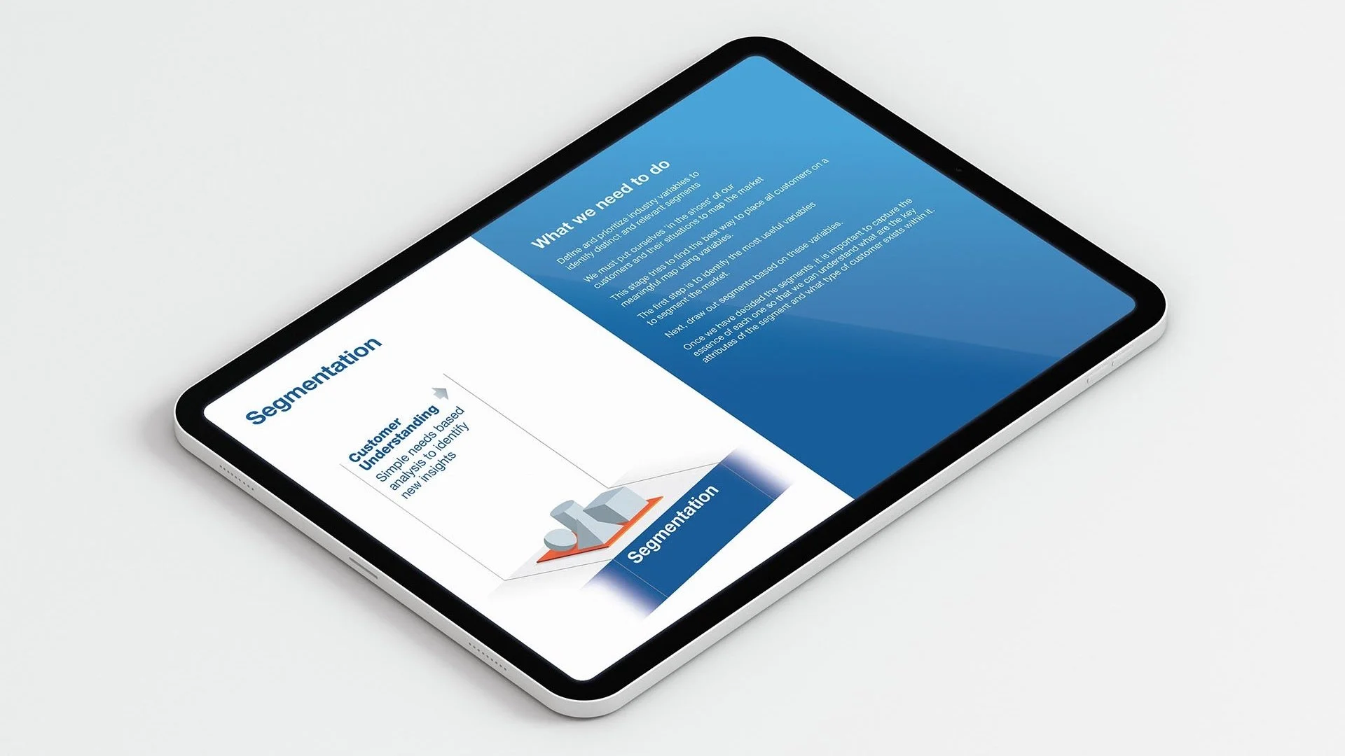 Digital tablet displaying a presentation slide titled 'Segmentation' with text and graphic elements on a white background