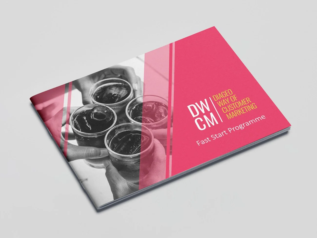 Brochure titled 'DWCM - Diageo Way of Customer Marketing' with the subtitle 'Fast Start Programme'. The cover features a black-and-white image of hands holding glasses of a dark beverage, possibly soda or cola, on a pink background.